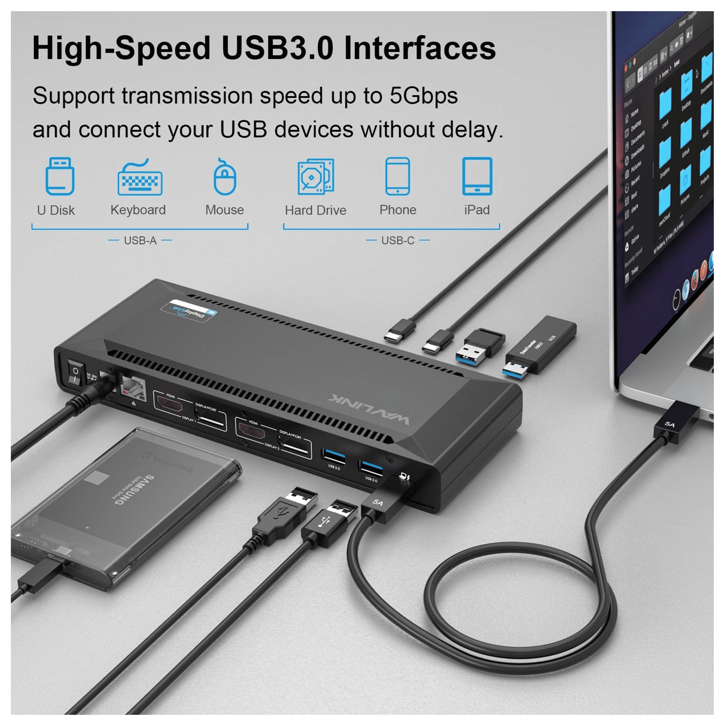 Een USB-hub met kabels aangesloten op een laptop en een Samsung-schijf.