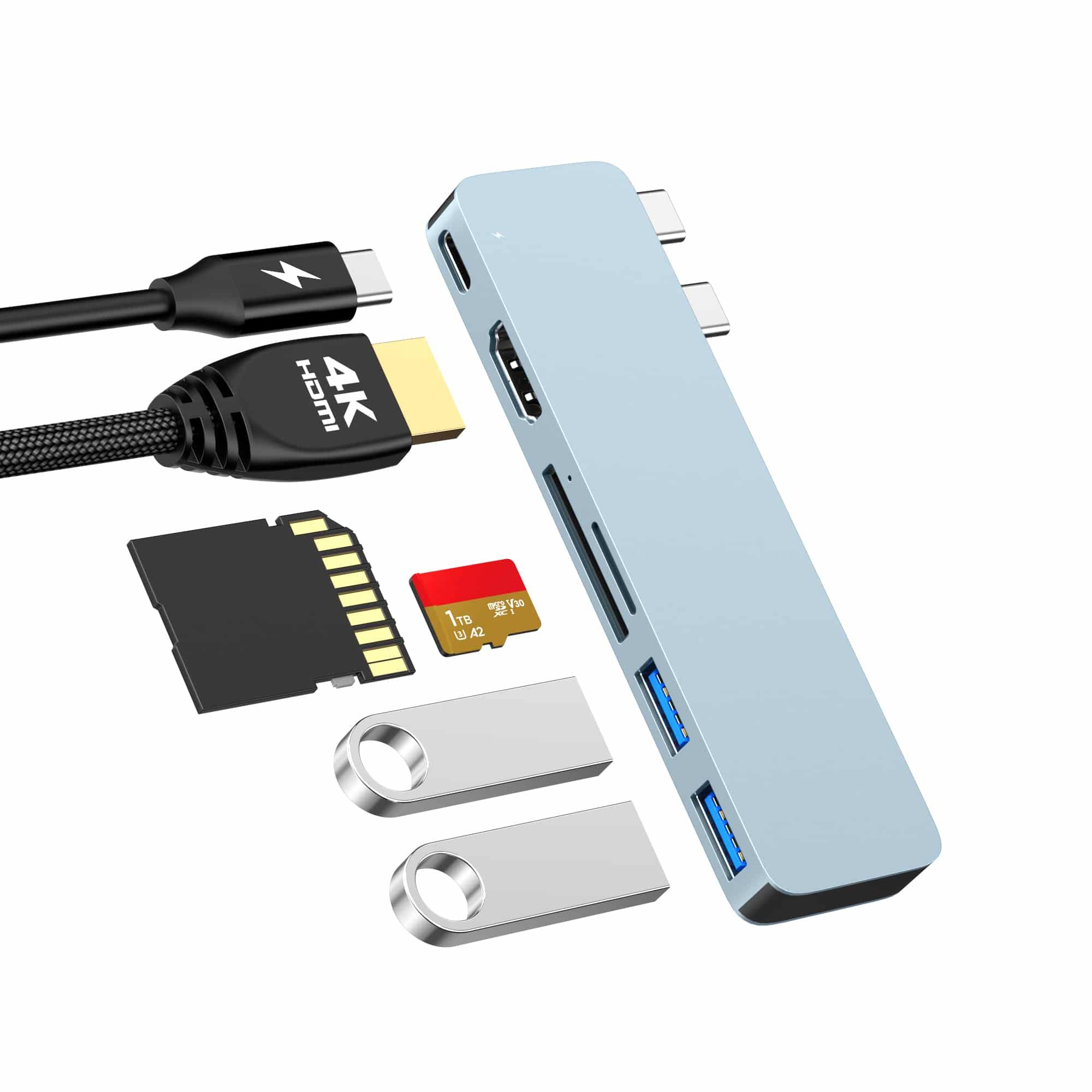 A silver USB-C hub with HDMI, SD, and USB ports, plus cables and memory cards.