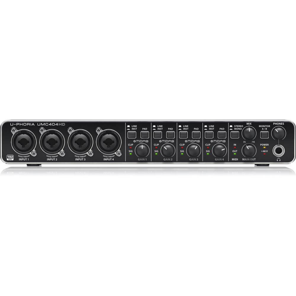 Czarny interfejs audio z czterema wejściami, gałkami i złączami.