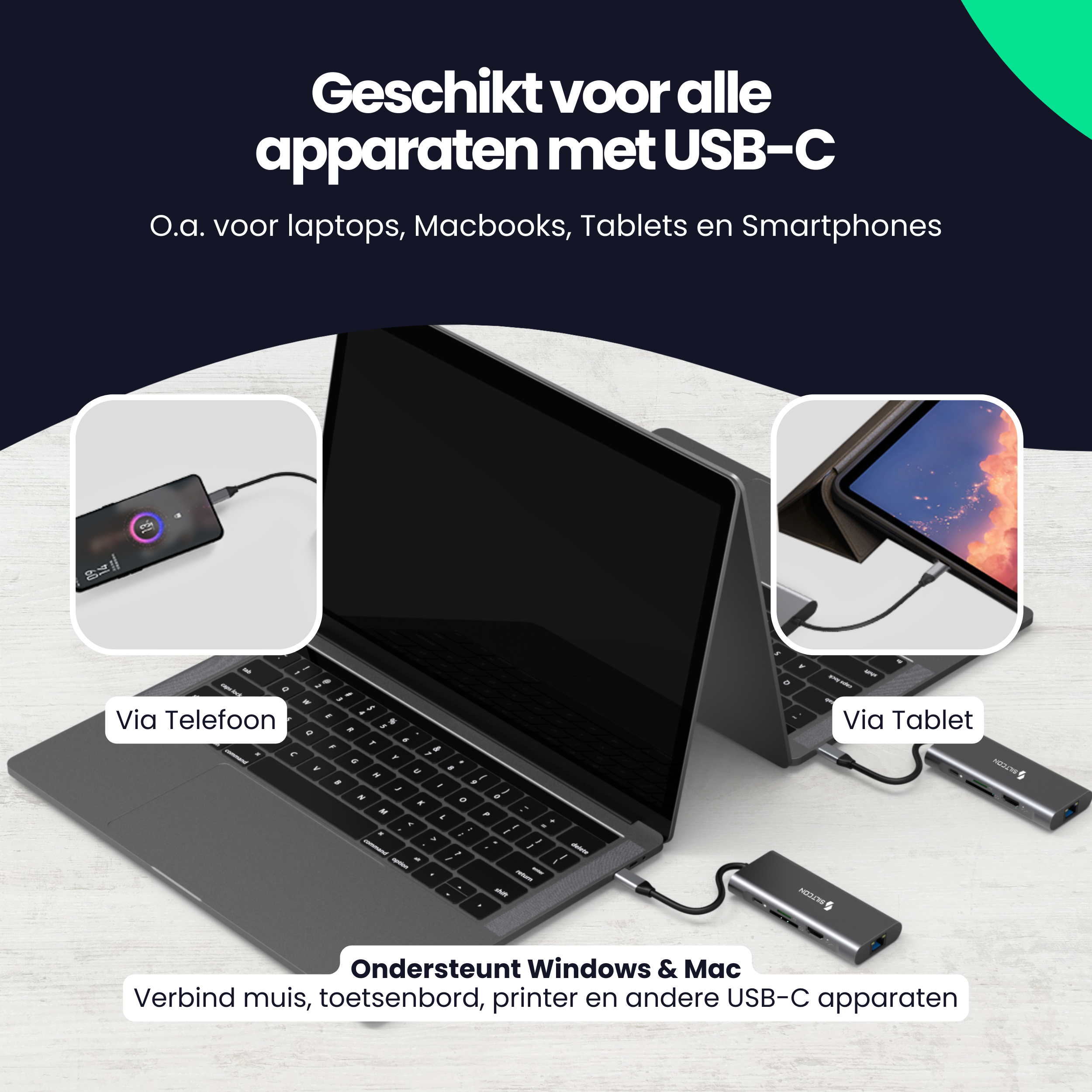 Laptop met USB-C hub, laadt smartphone en tablet op.