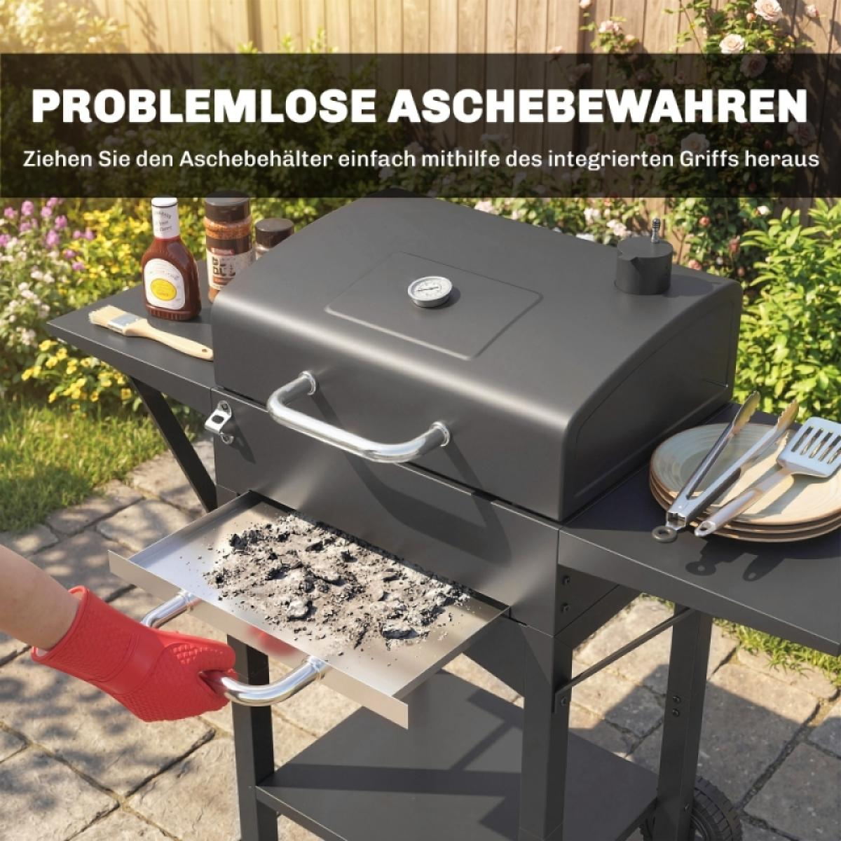 Ein Grill mit einem herausziehbaren Aschebehälter, den eine Hand mit roter Handschuh trägt.