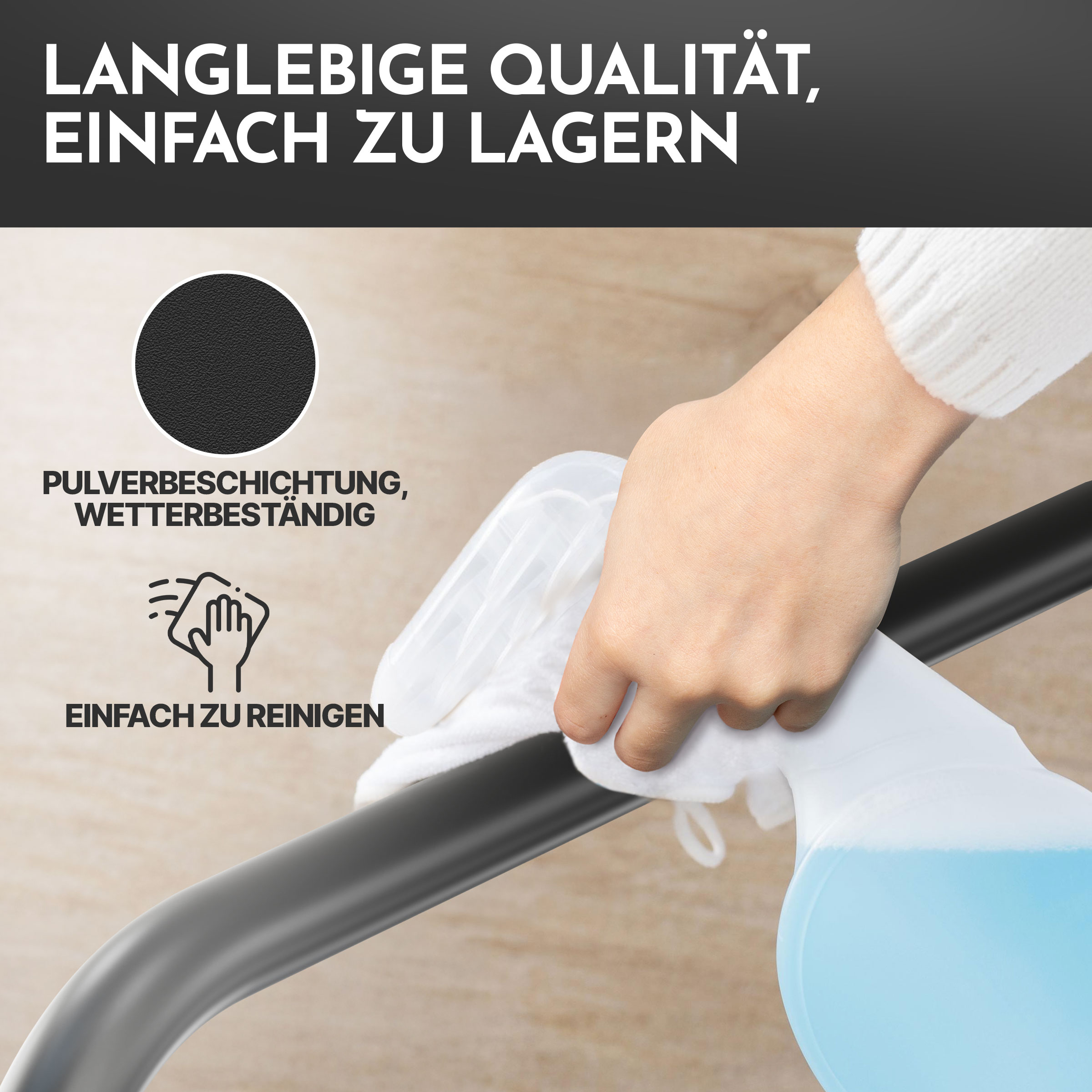 Eine Hand mit weißem Ärmel wischt mit einem Tuch über ein schwarzes Rohr.