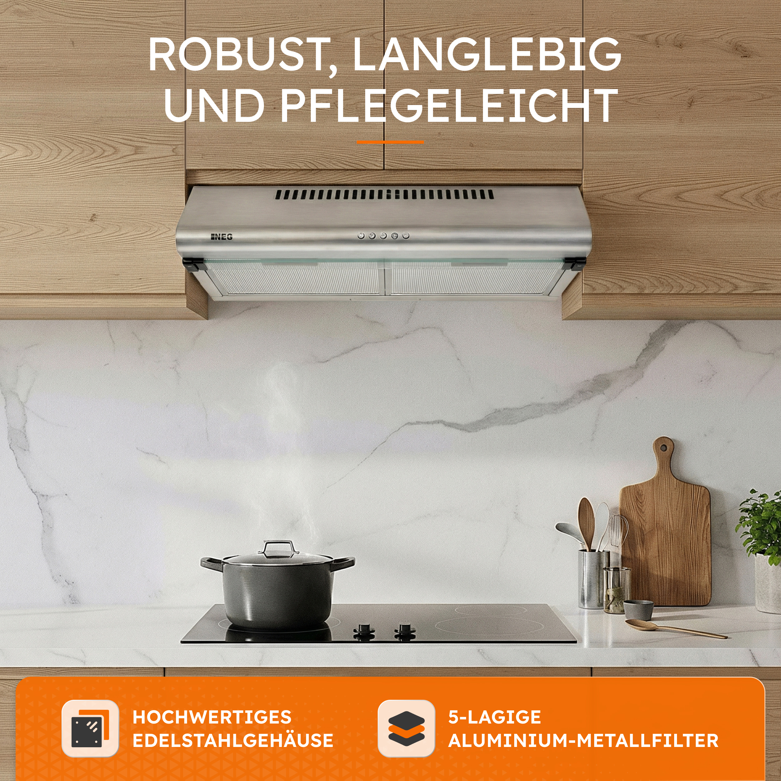 Edelstahl-Dunstabzugshaube über einem Kochfeld mit Topf.