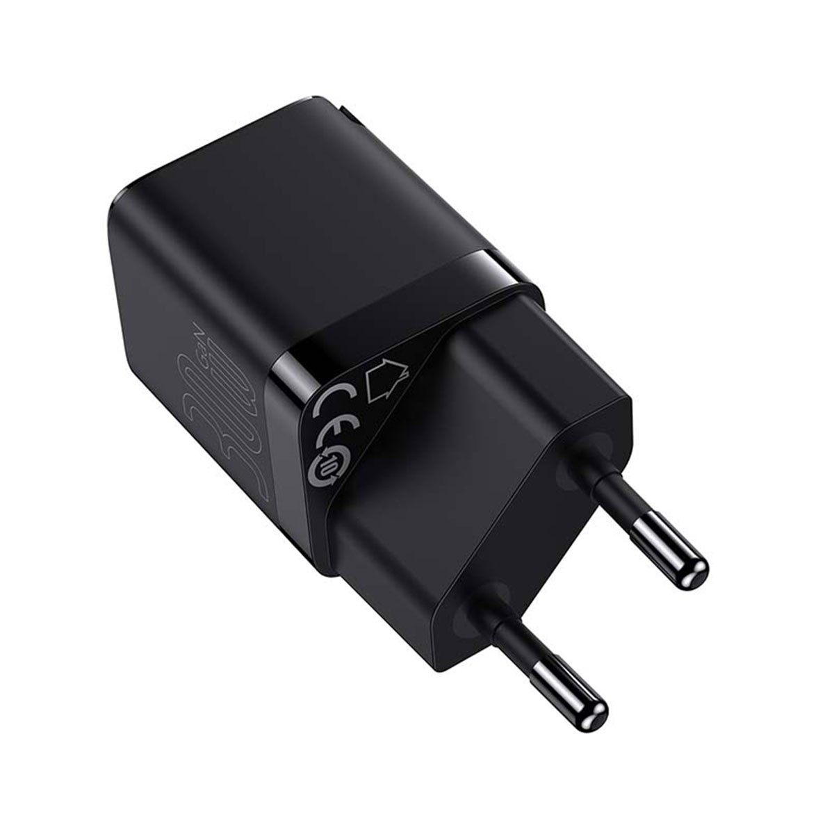 Un adattatore di corrente nero con due pin metallici.