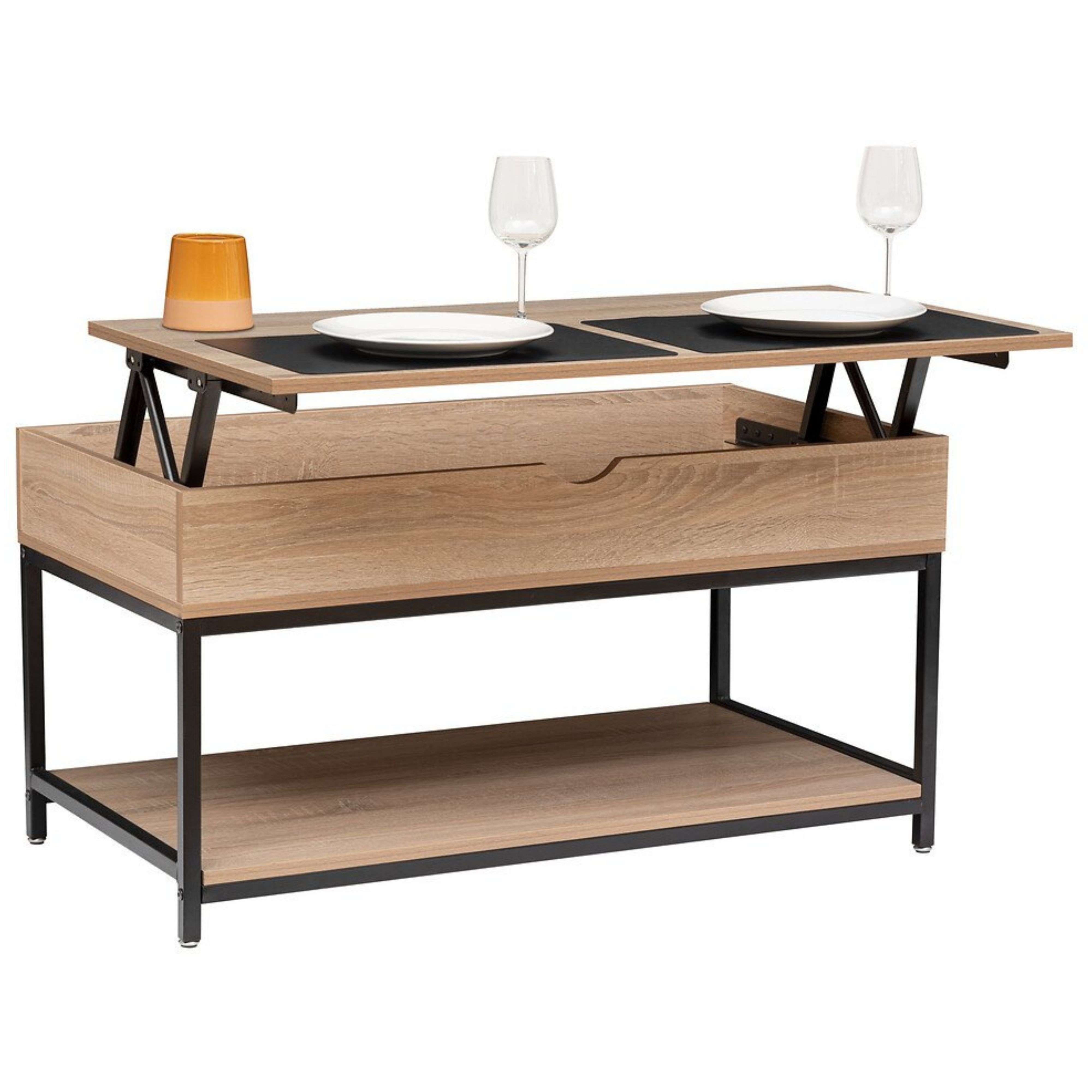 Una mesa de centro de madera elevable con patas de metal negro, dos platos, vasos y un recipiente naranja.