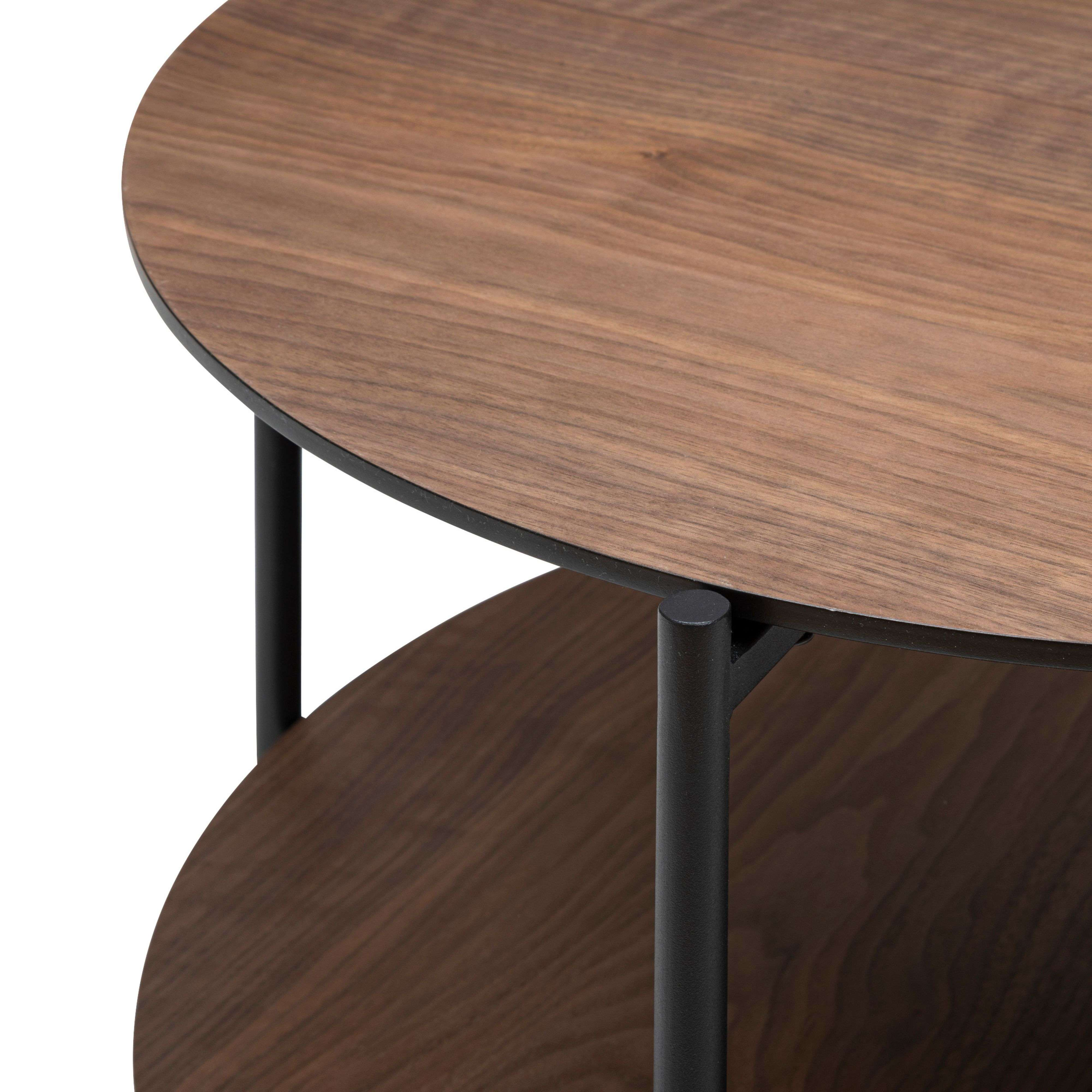 Mesa de centro redonda de madera de dos niveles con patas negras.