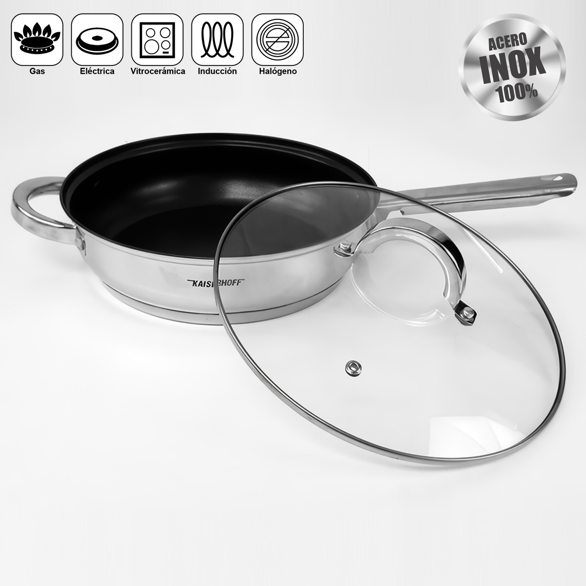 Una sartén de acero inoxidable con tapa de cristal sobre fondo blanco.