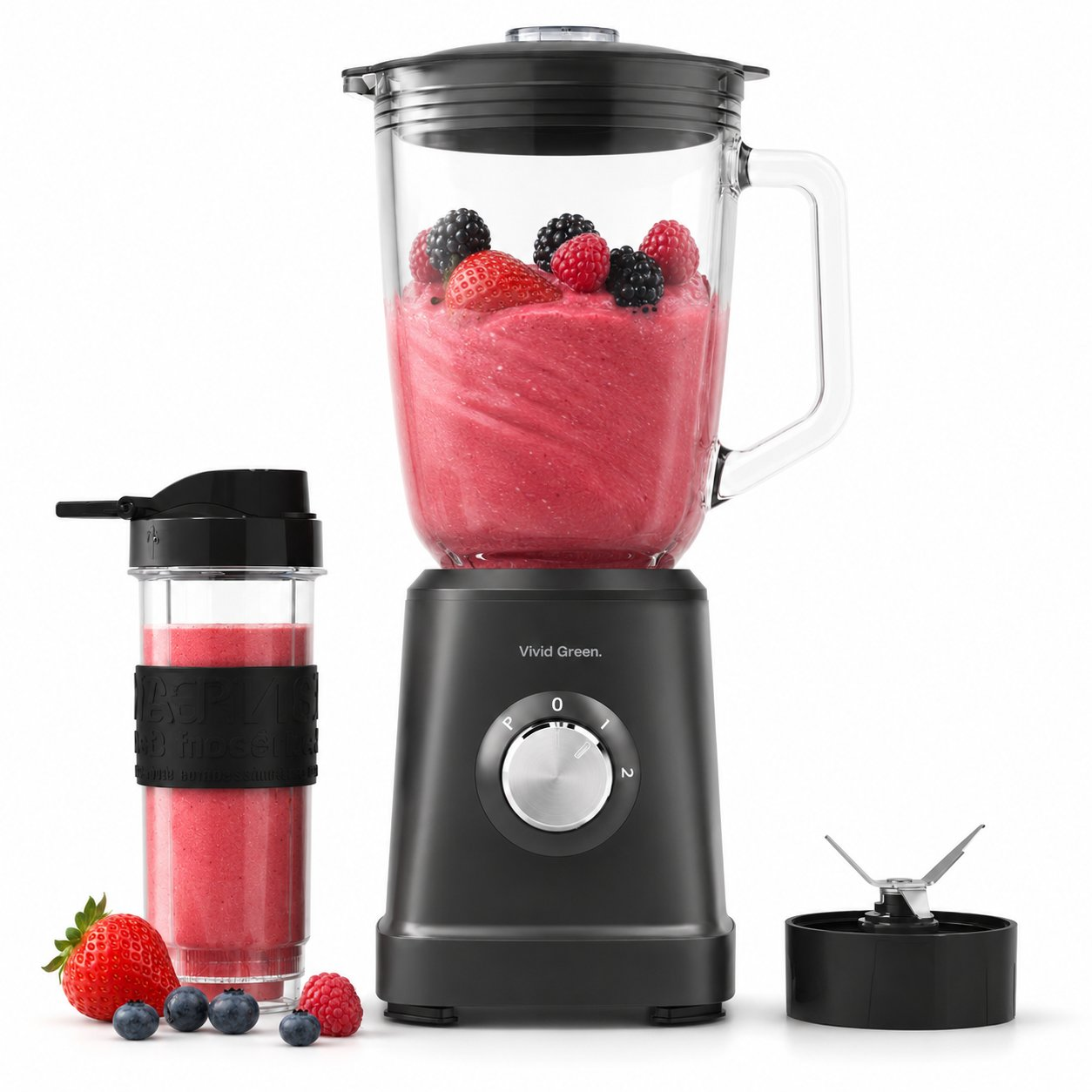 A black blender with a glass jar filled with red smoothie and berries. A travel cup and fruits are beside it.