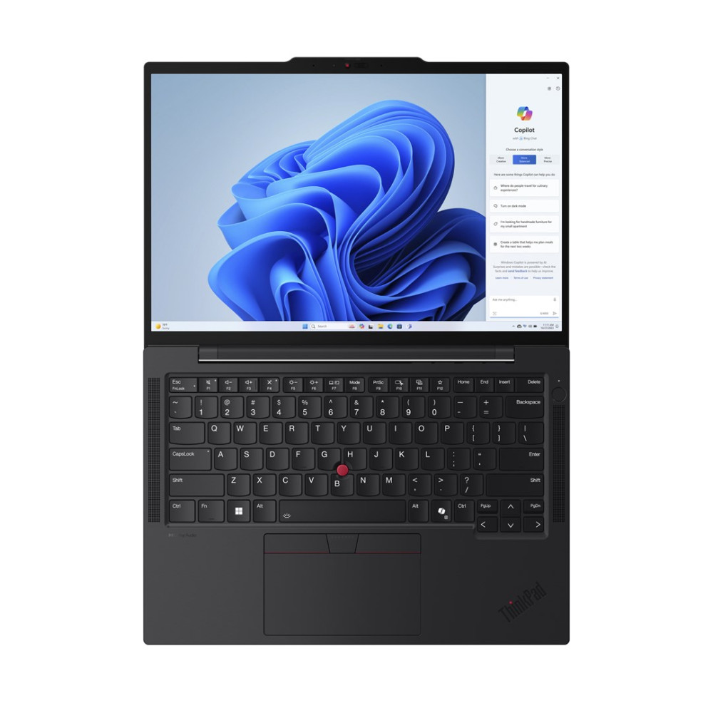 Otwarty czarny laptop z tłem Windows i klawiaturą.