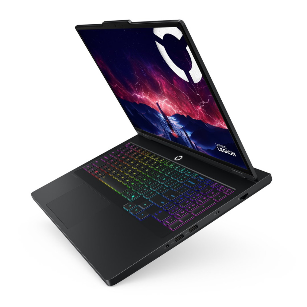 Czarny laptop z podświetlaną klawiaturą i dramatyczną tapetą.