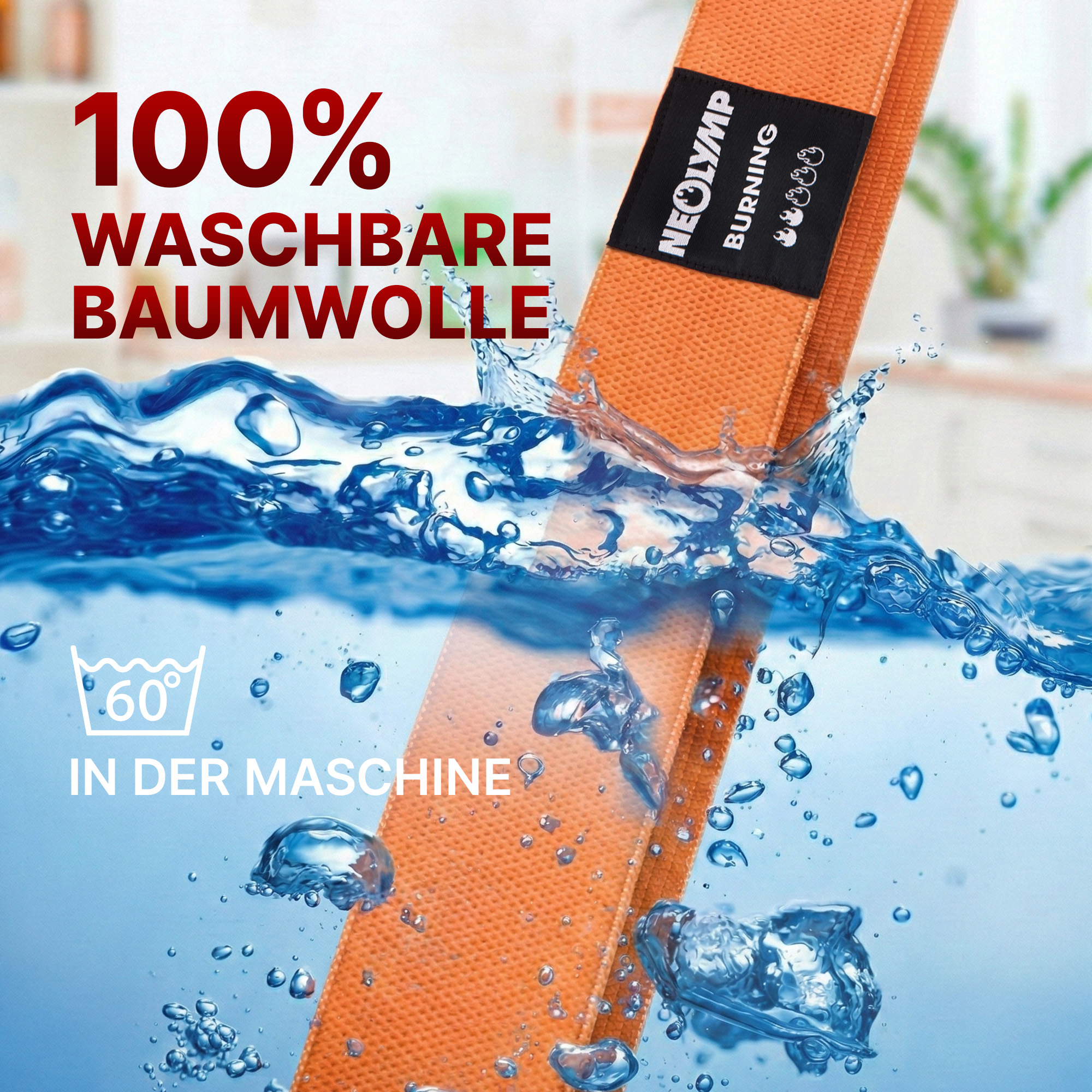 Ein oranges Band mit der Aufschrift '100% Waschbare Baumwolle' taucht in Wasser ein.