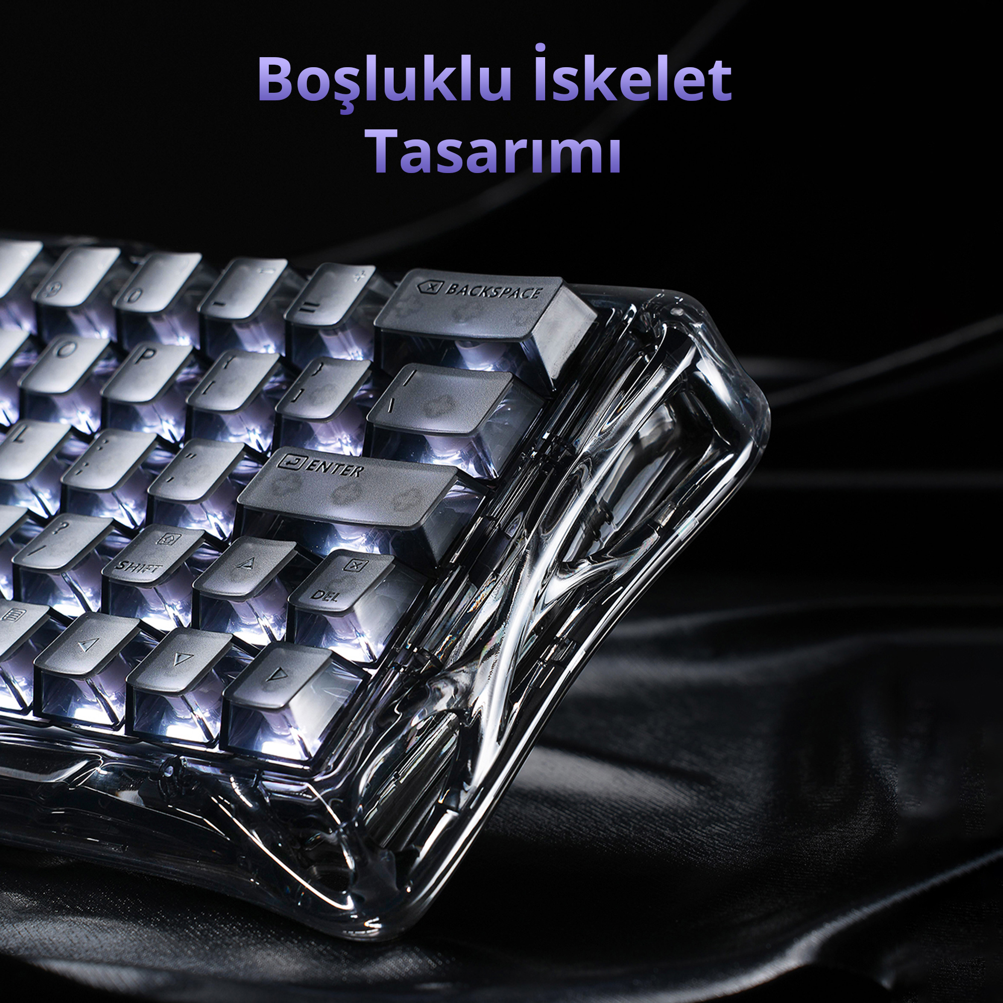 Şeffaf tasarımlı, aydınlatmalı tuşlara sahip klavye, siyah arka plan üzerinde.