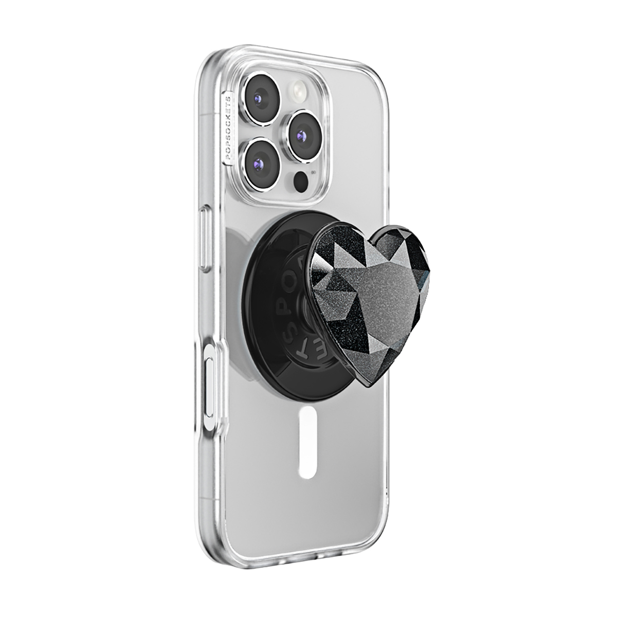 Un teléfono transparente con un PopSocket negro en forma de corazón.