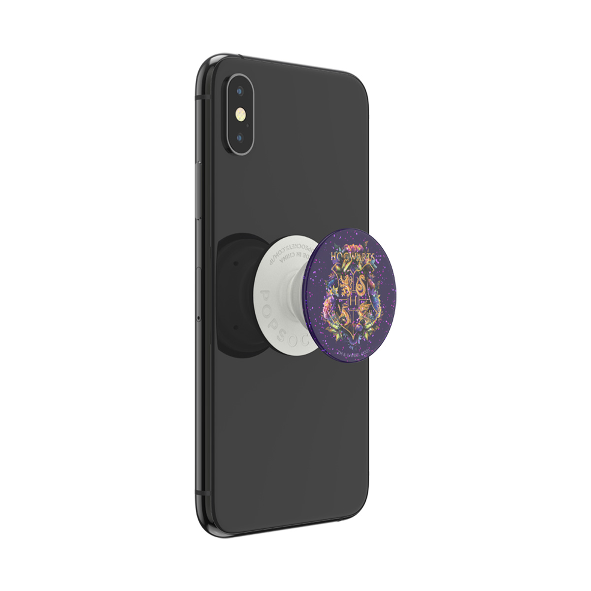 Un iPhone negro con un PopSocket con el escudo de Hogwarts en la parte posterior.