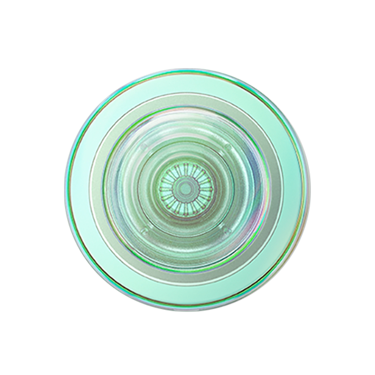 Una tapa verde redonda y translúcida con círculos concéntricos y un patrón de estrella en el centro.