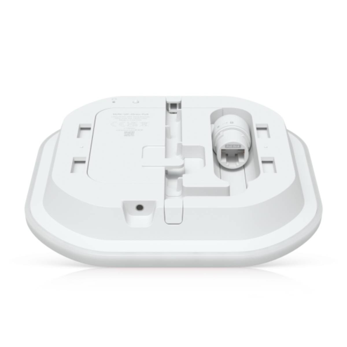 Parte inferiore di un access point Wi-Fi bianco con porte e caratteristiche di montaggio.