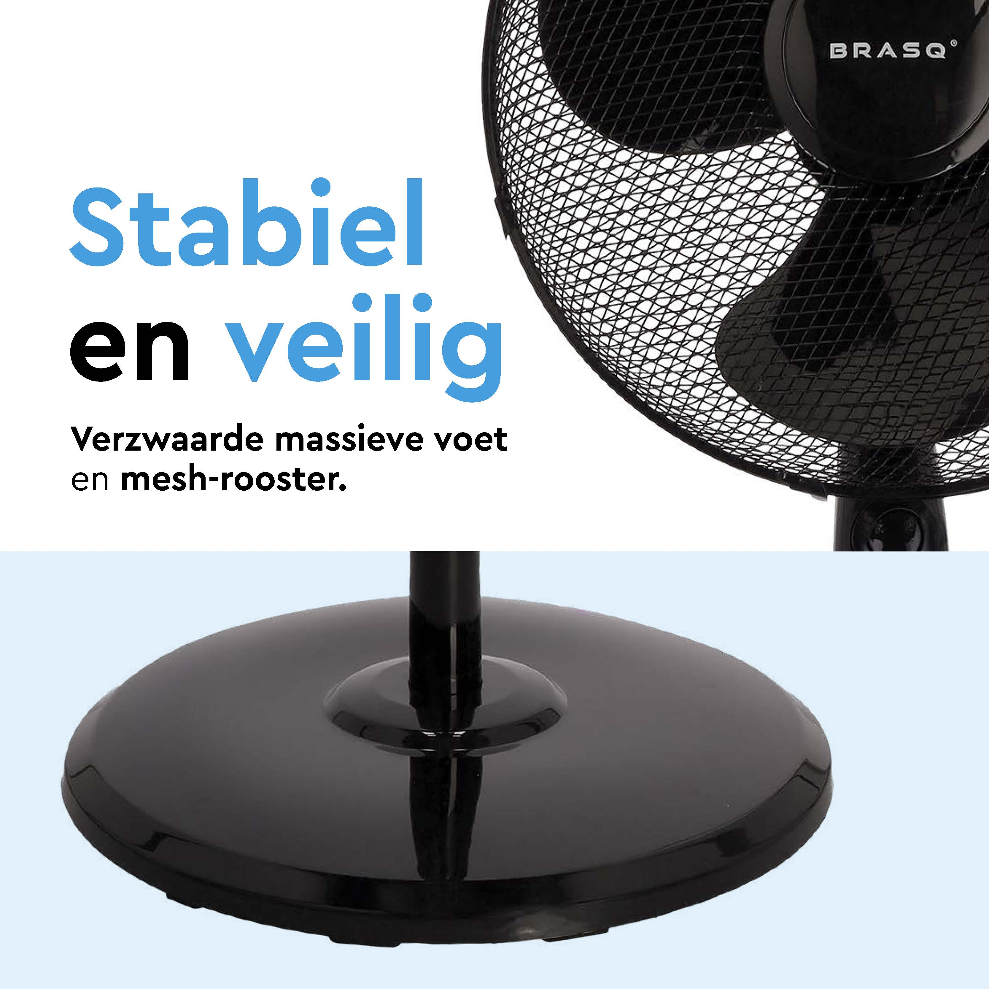 A black standing fan with a round base and mesh grille.