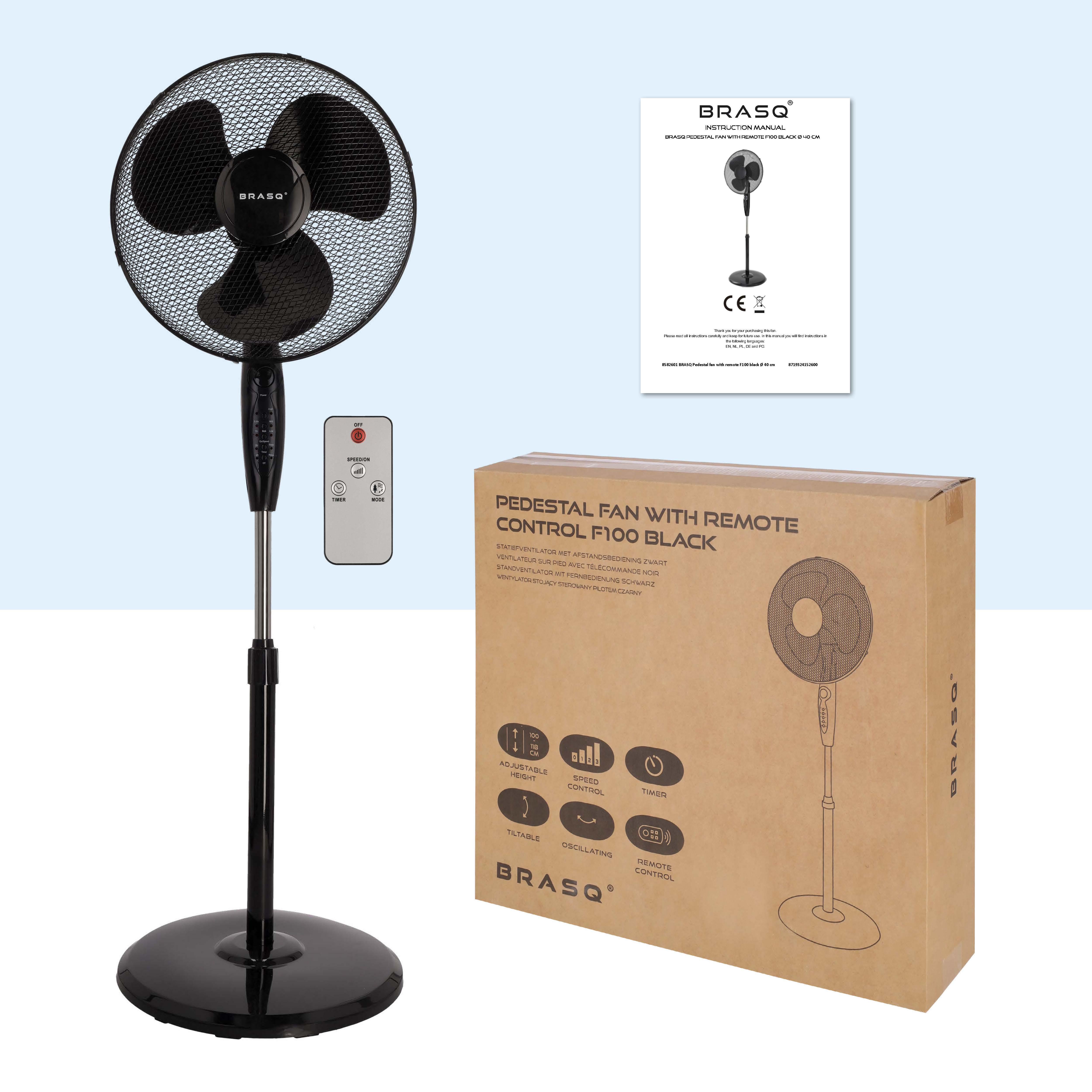 Black pedestal fan with remote, manual, and box. Features adjustable height.