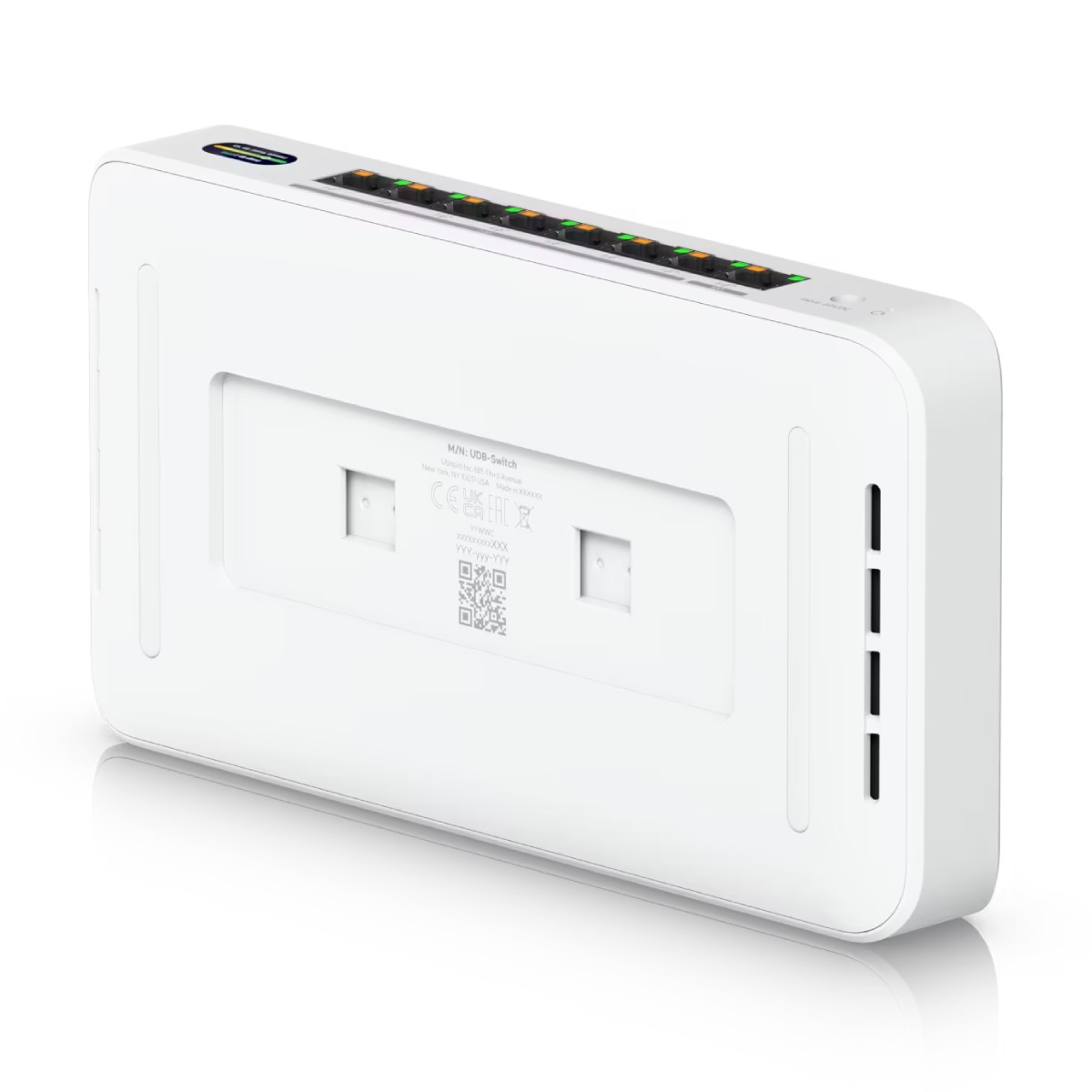 Uno switch di rete bianco con otto porte e LED verdi.