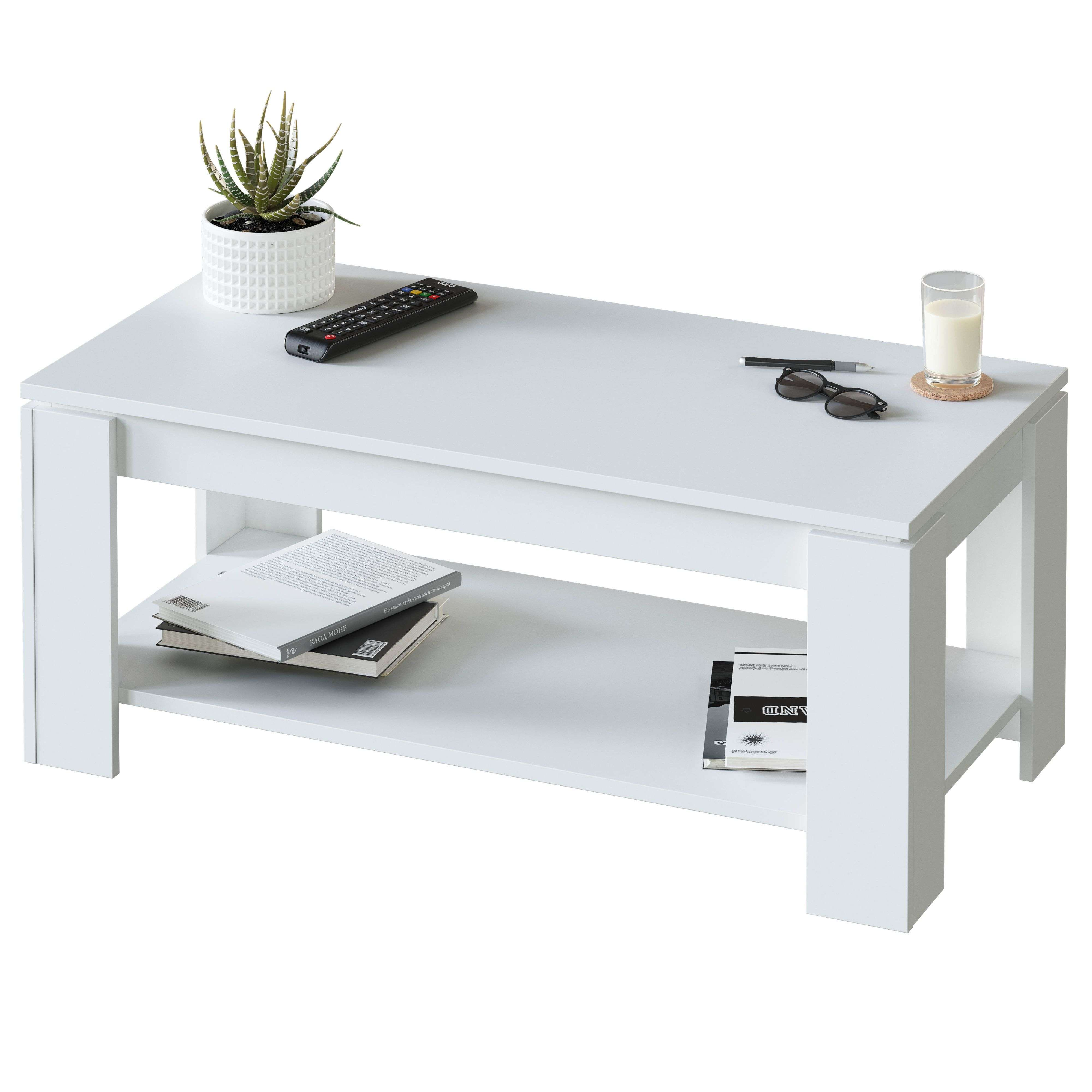 Mesa de centro blanca con mando, planta, gafas y vaso de leche.