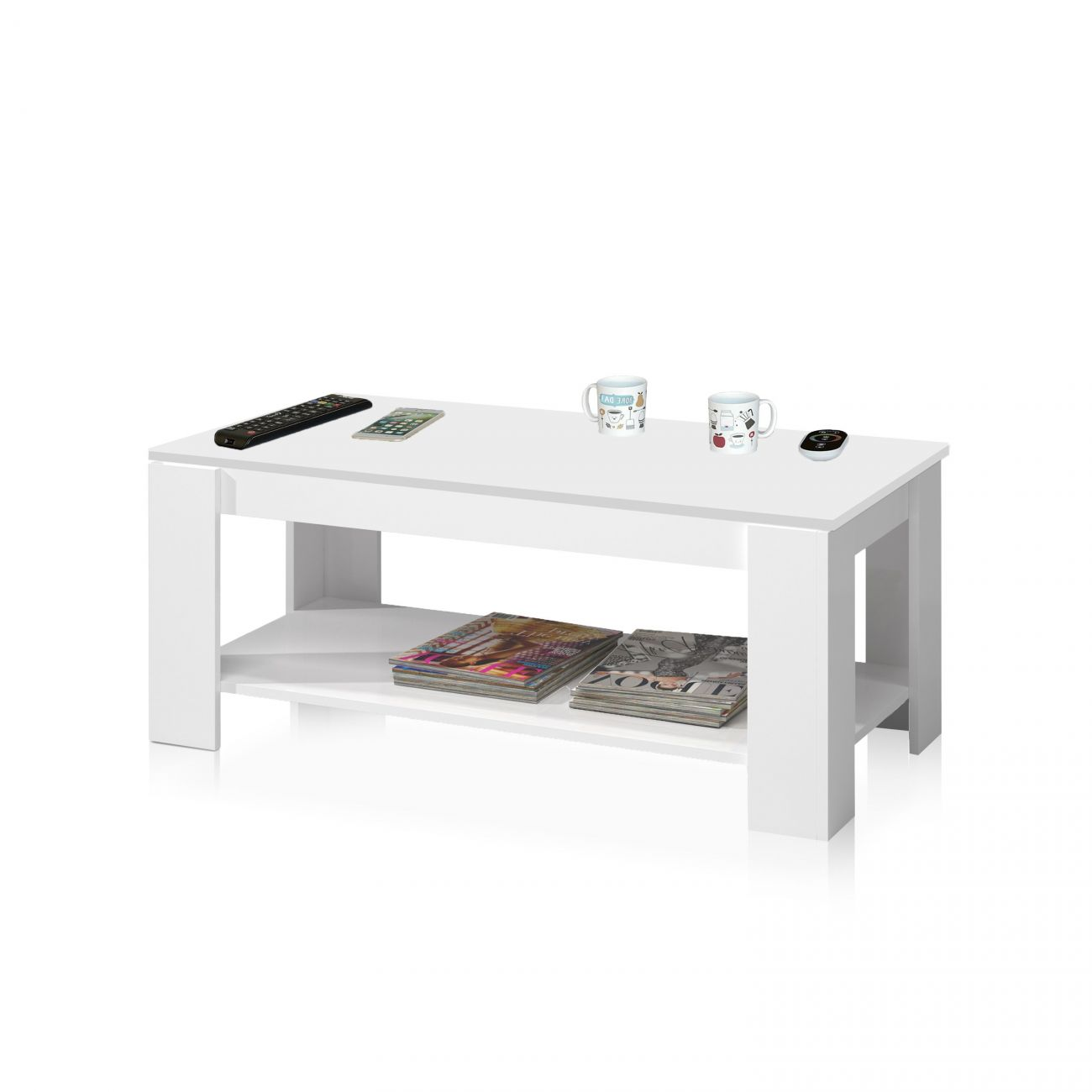 Una mesa de centro blanca con mando, teléfono, tazas y revistas.
