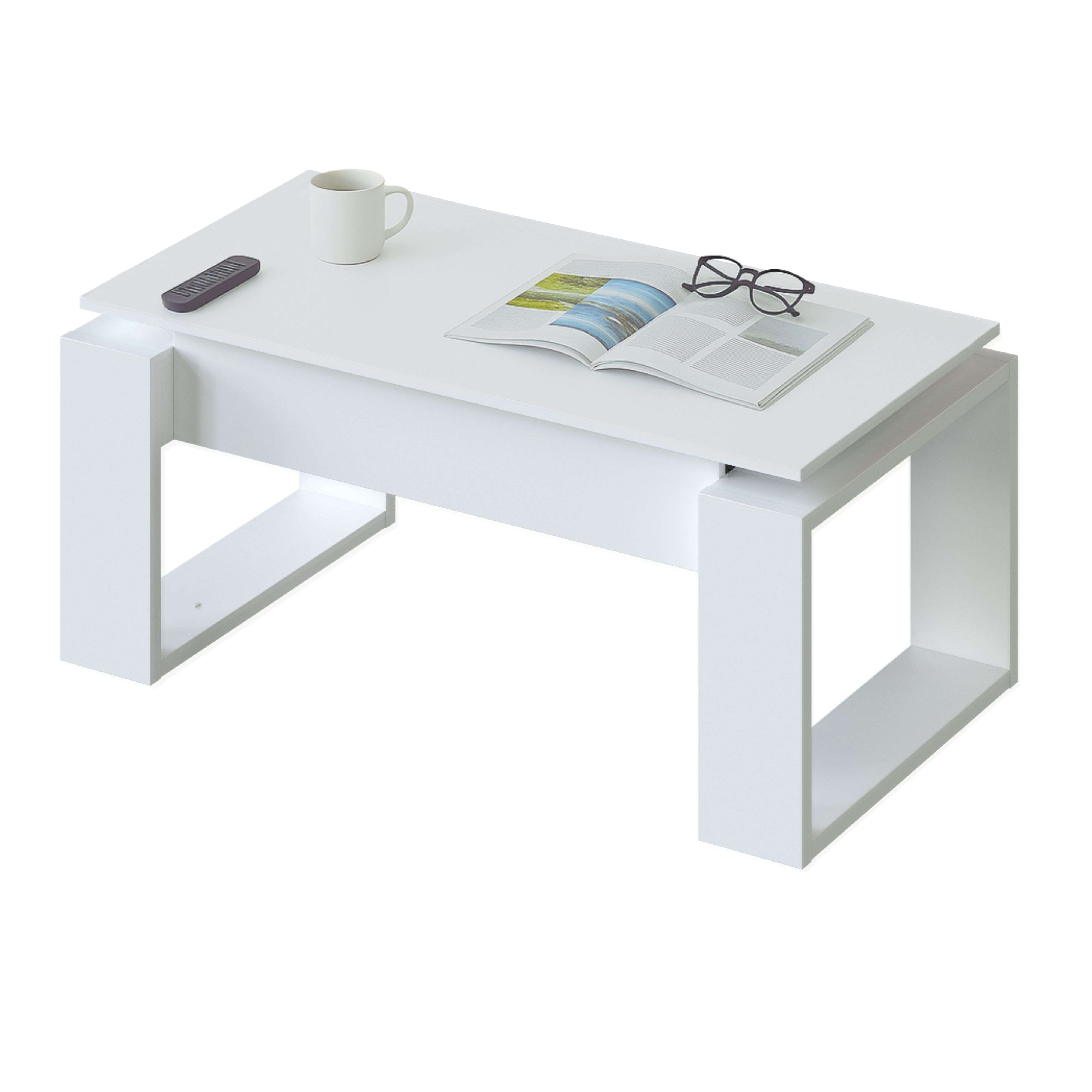 Una mesa de centro blanca con mando, taza, gafas y libro abierto.