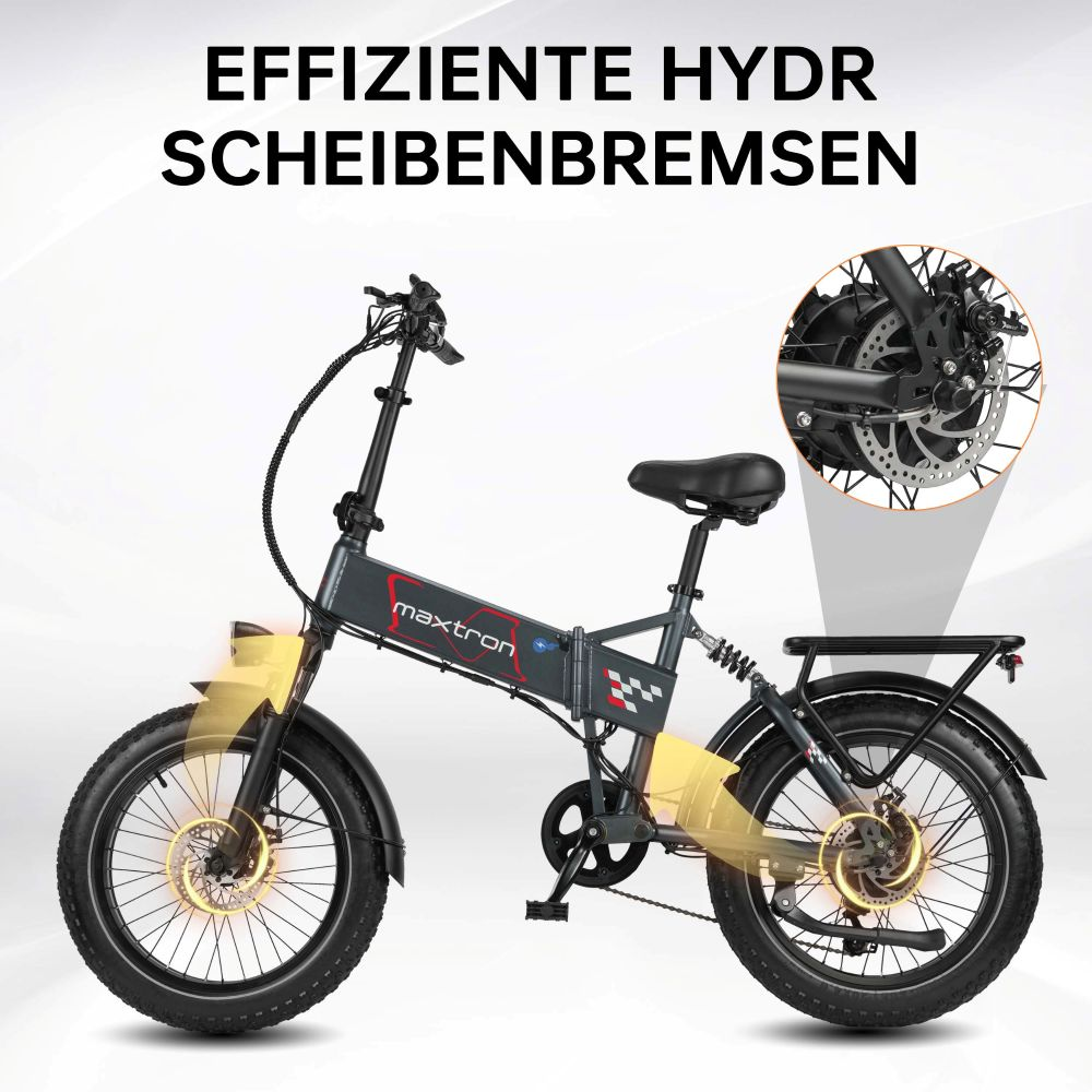 Bicicleta eléctrica plegable gris con frenos de disco resaltados.