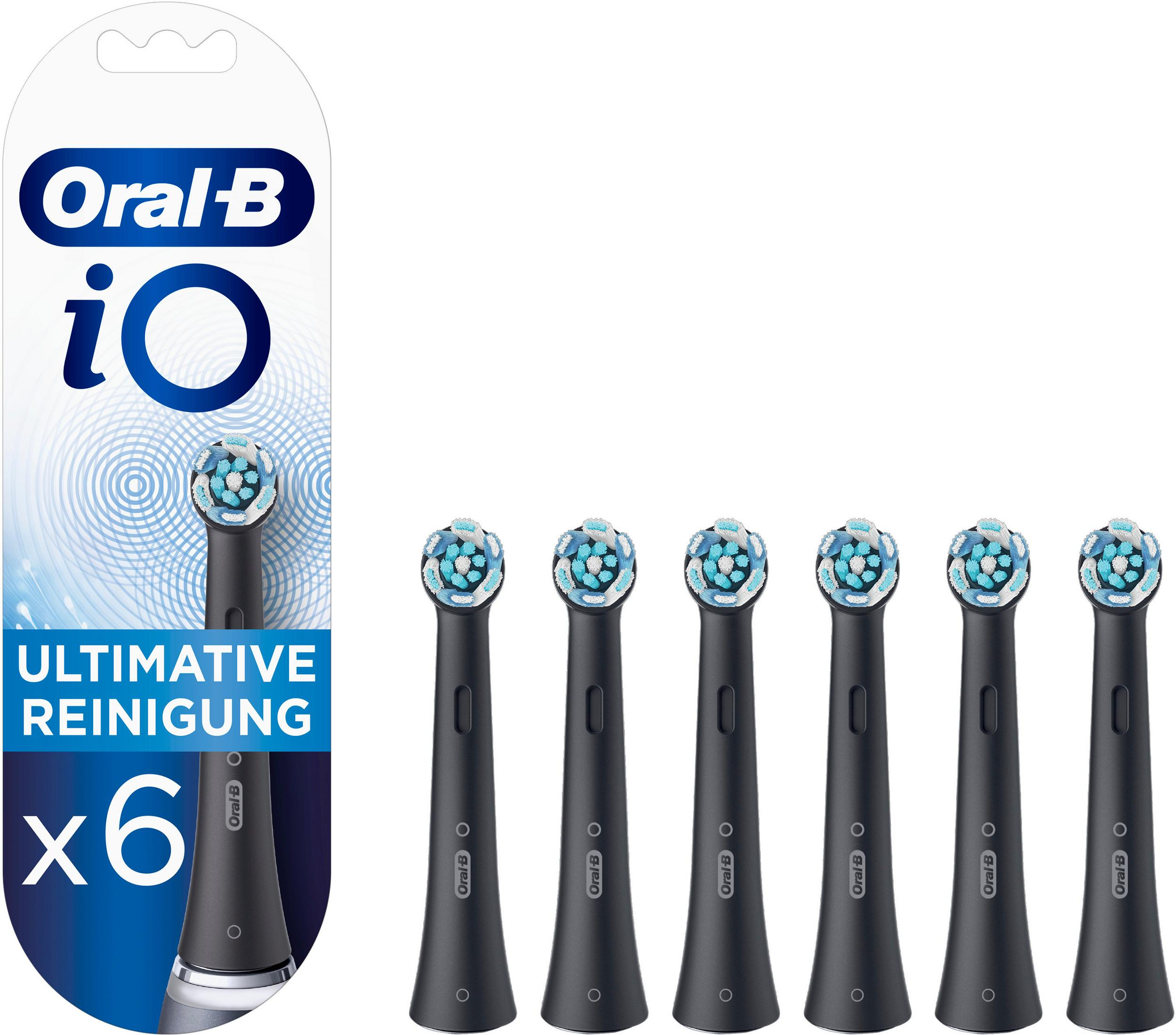 Paquete con seis cabezales negros Oral-B iO, cerdas azules y blancas.