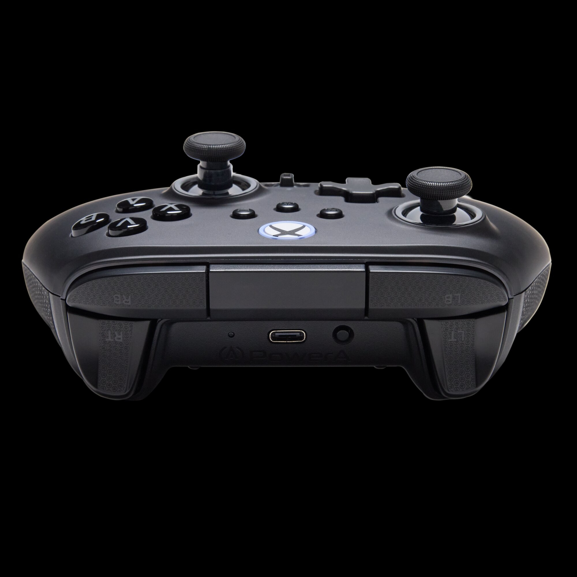 Czarny kontroler Xbox z dwoma analogowymi drążkami i różnymi przyciskami.