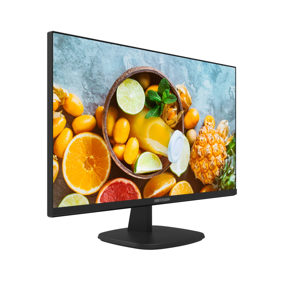 Un monitor mostra un primo piano di frutta fresca, tra cui arance, lime, kumquat e ananas.
