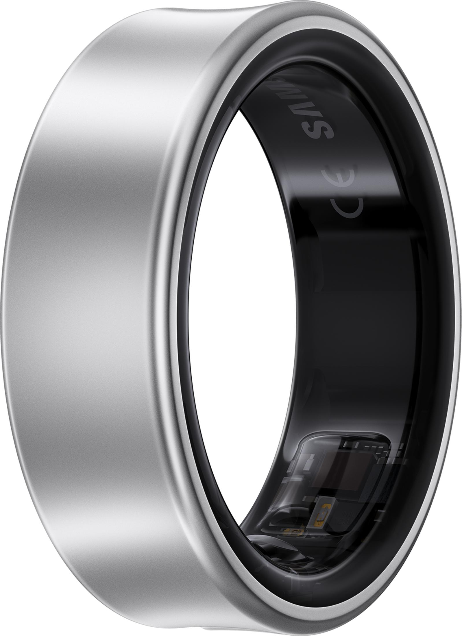 Ein silberner Ring mit schwarzem Inneren und sichtbarer Elektronik.