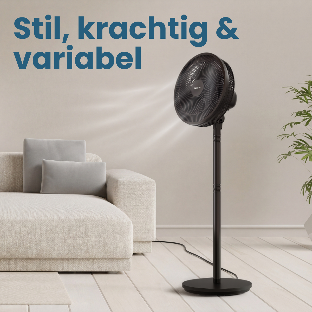 A black standing fan is next to a light sofa. Airflow is visible.