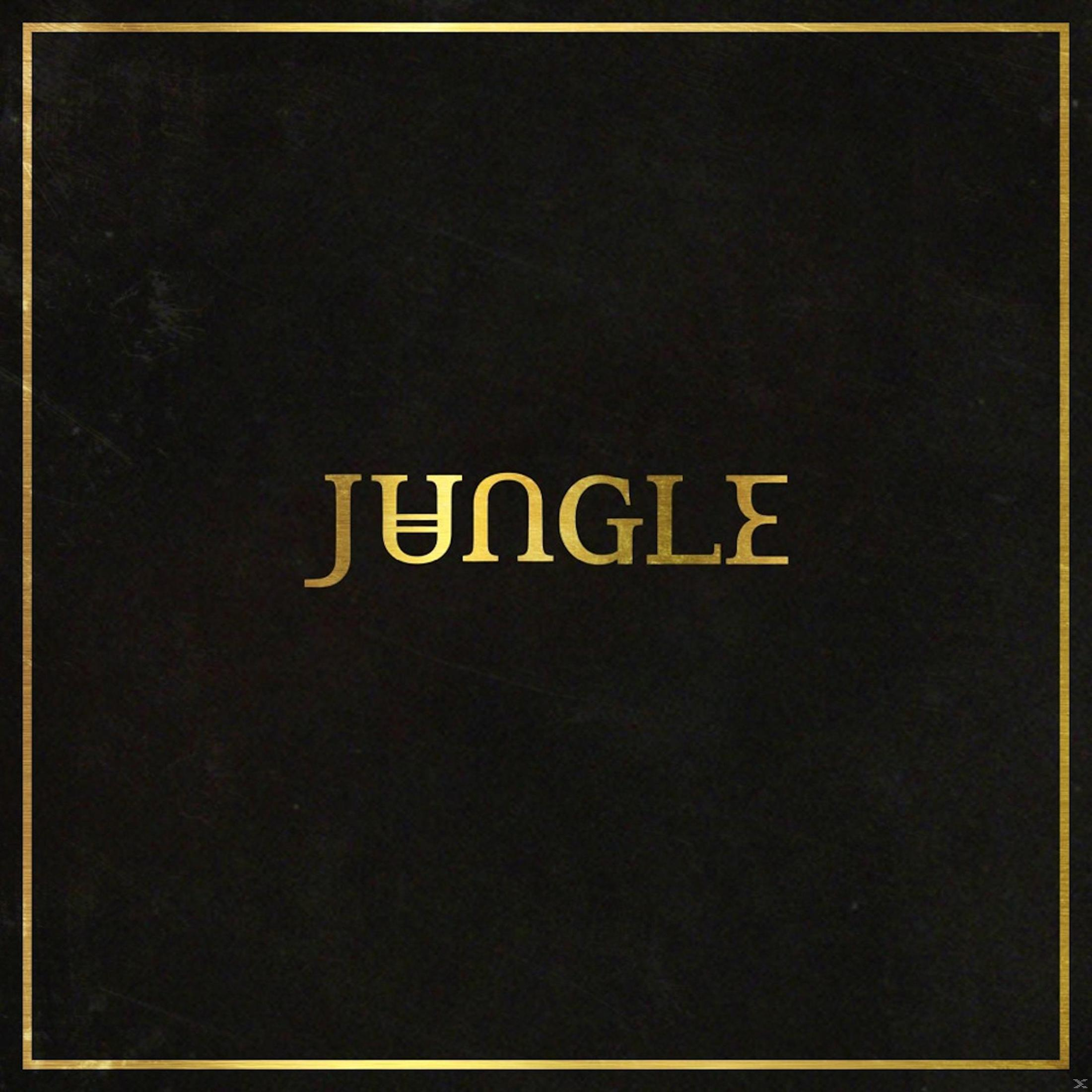 Gouden tekst "JUNGLE" op zwarte achtergrond met gouden lijst.