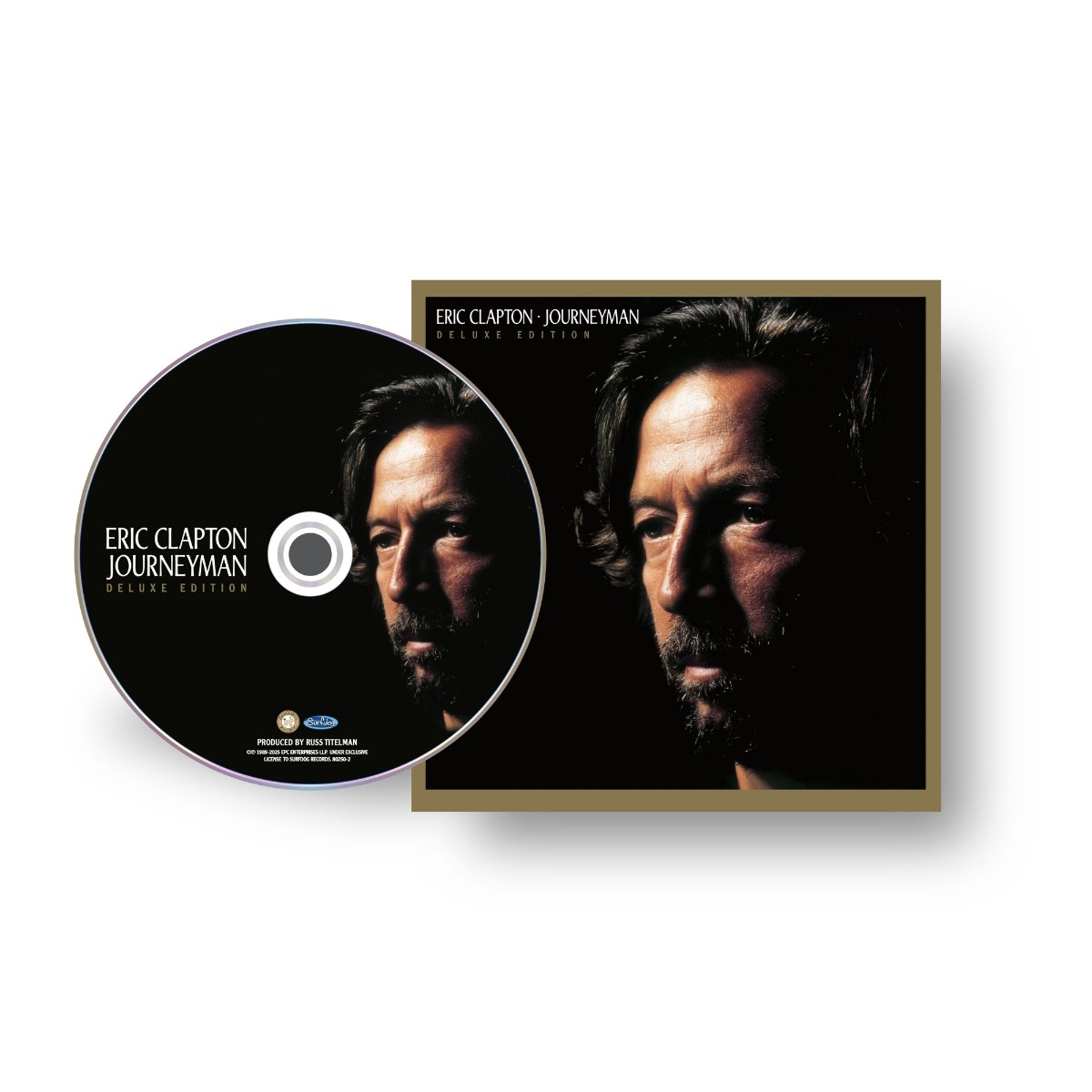 CD en hoes van Eric Claptons Journeyman Deluxe Edition met zijn portret.