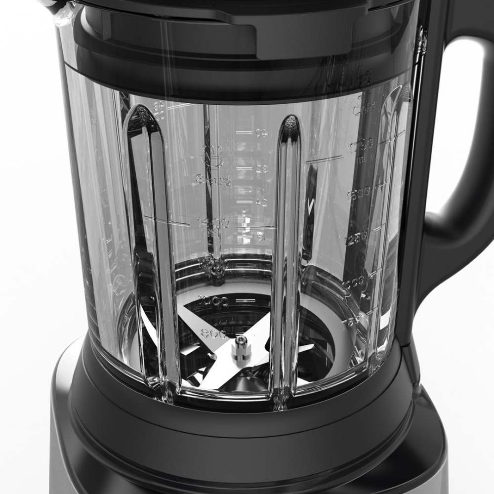 Nahaufnahme eines transparenten Mixbehälters mit Edelstahlklingen und Messmarkierungen.
