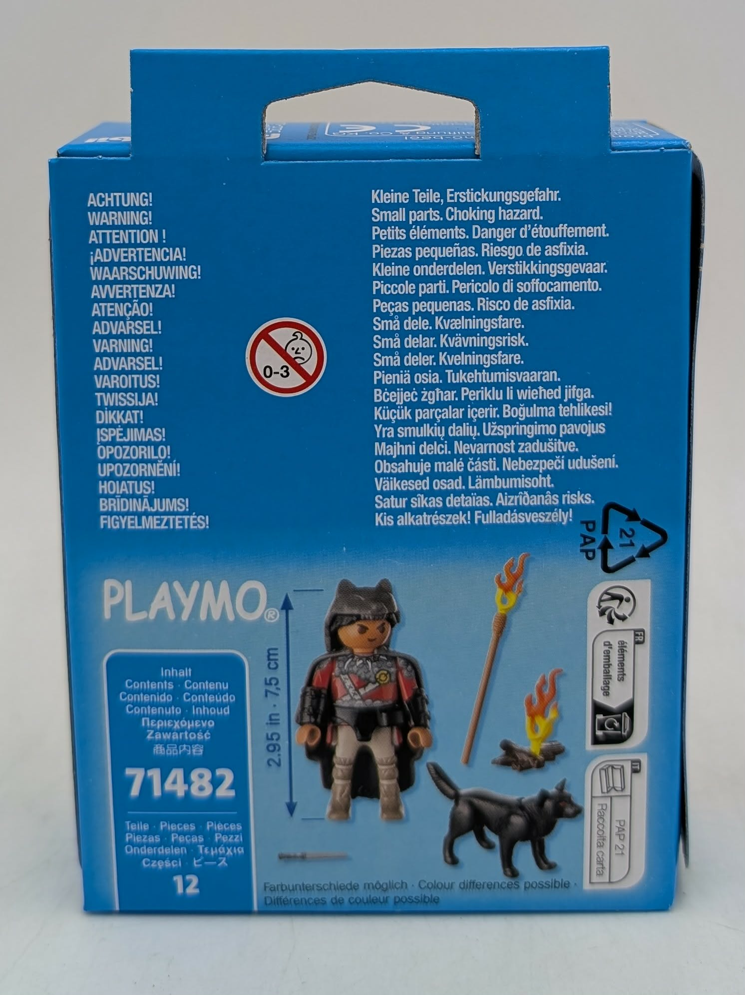 Playmobil-Verpackung mit Figur, Wolf, Lagerfeuer und Warnhinweisen.