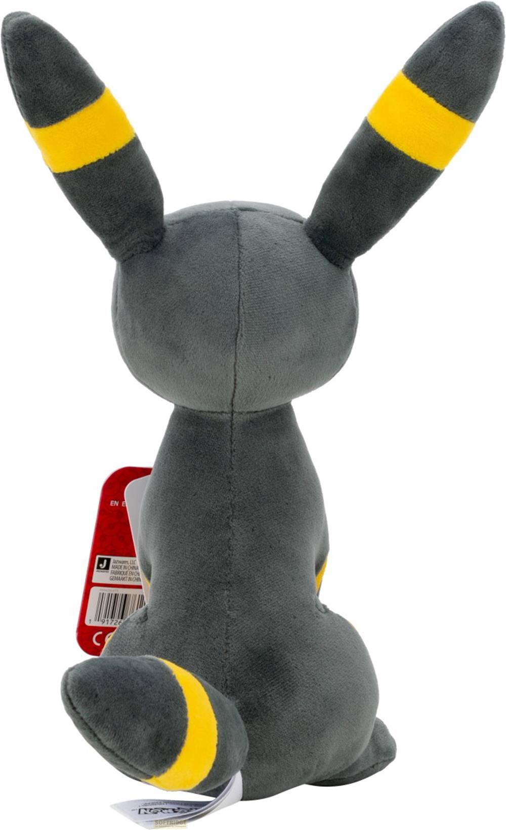 Figurine en peluche grise avec anneaux jaunes aux oreilles et à la queue.