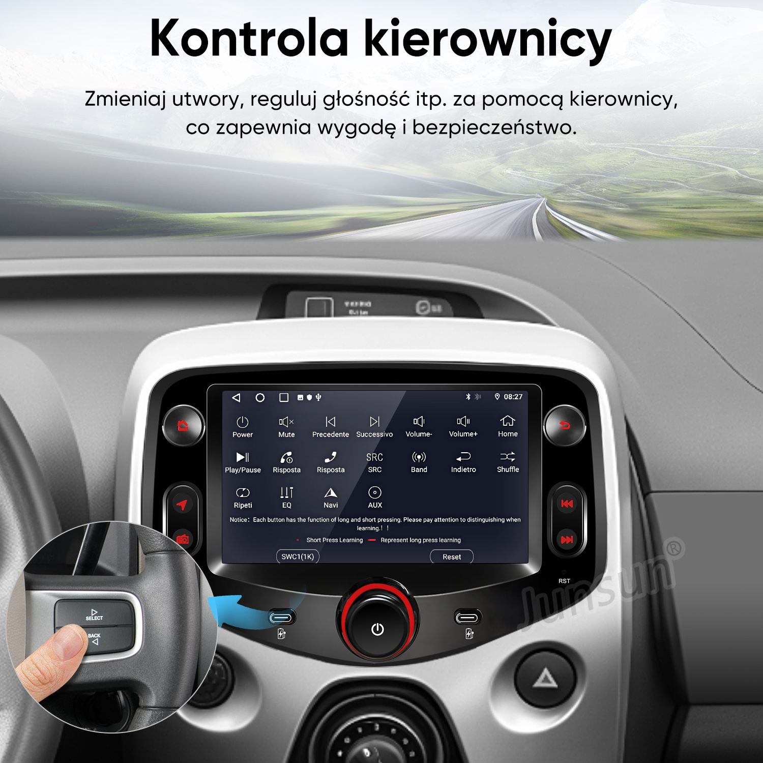 Palec naciska przycisk na kierownicy samochodu, wskazując na ekran dotykowy.