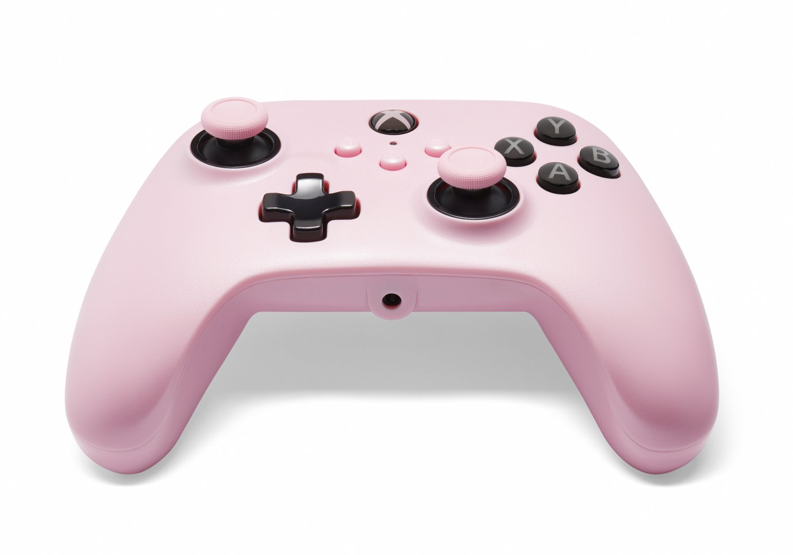 Różowy kontroler Xbox z czarnymi przyciskami i joystickami na białym tle.