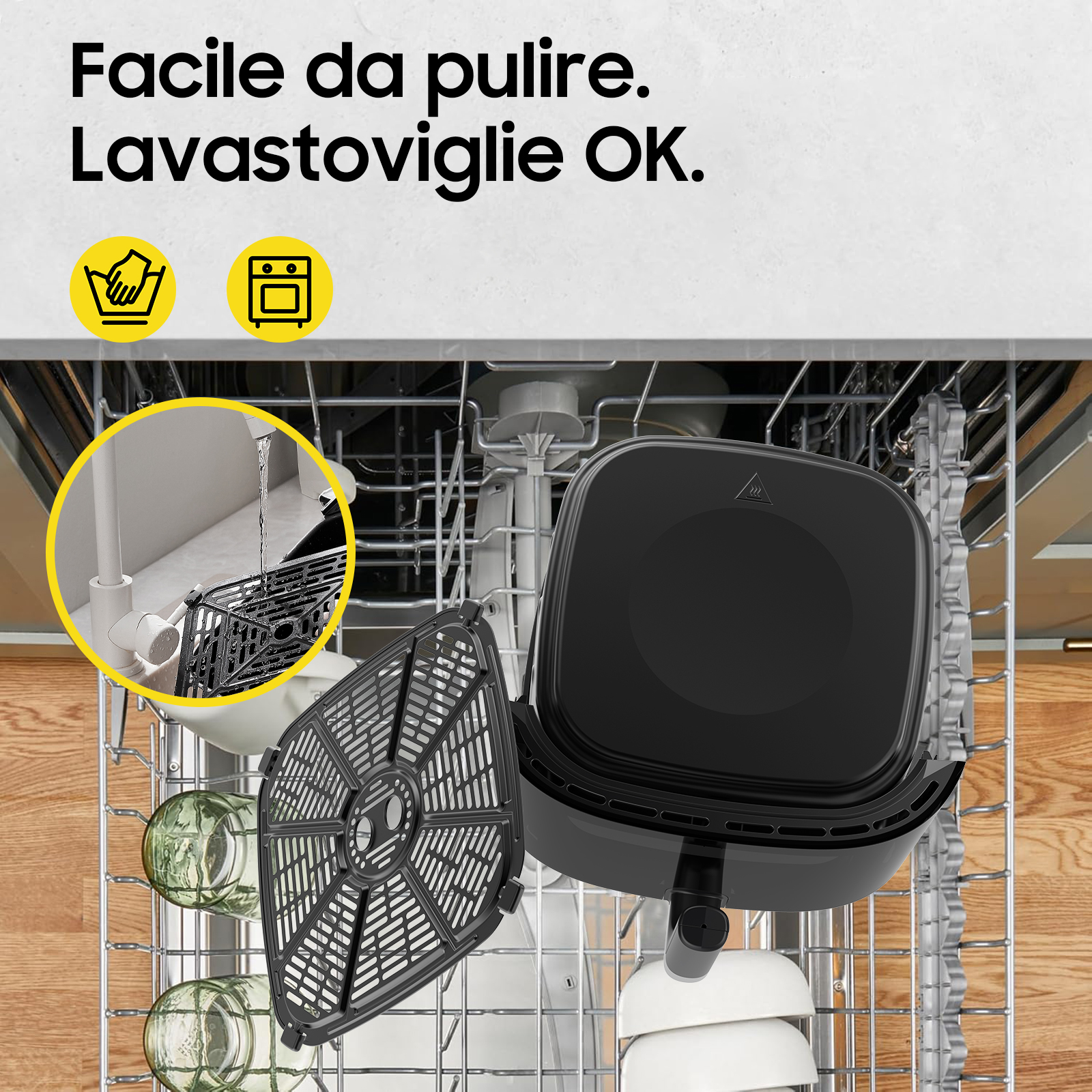 Cestello nero friggitrice ad aria in lavastoviglie con bicchieri.