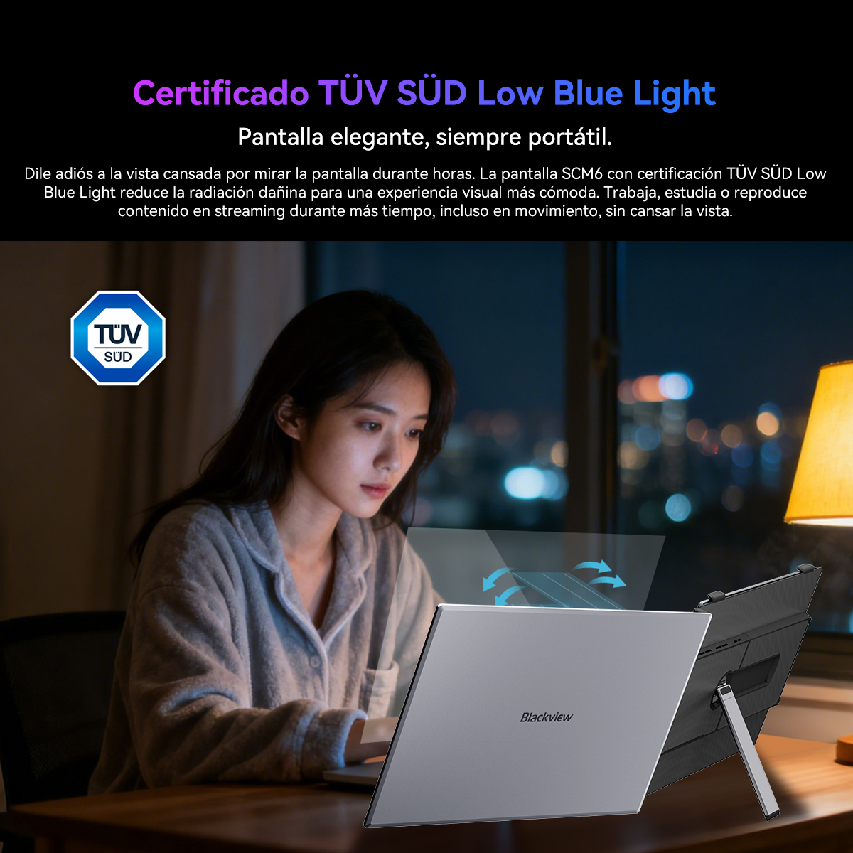 Una mujer mira un portátil con certificación TÜV SÜD Low Blue Light.