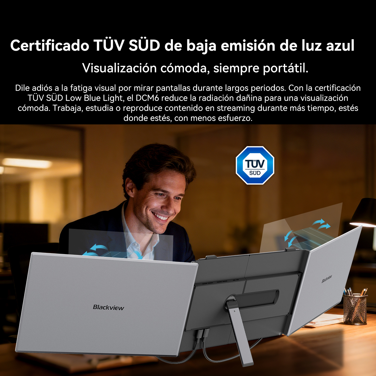 Hombre sonríe ante pantallas duales Blackview, certificación TÜV SÜD de baja luz azul.