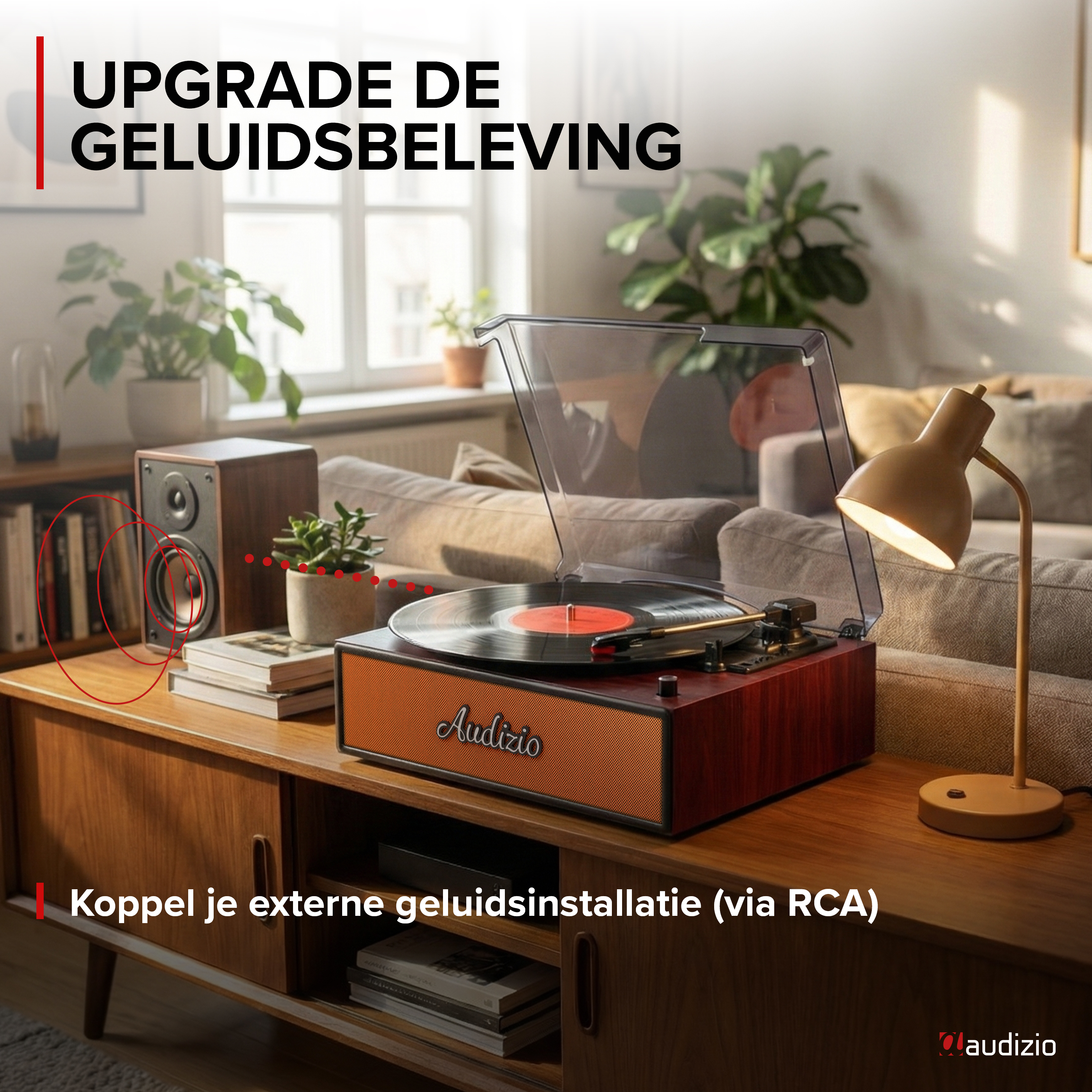 Un tocadiscos con disco de vinilo y un altavoz sobre un mueble de madera.