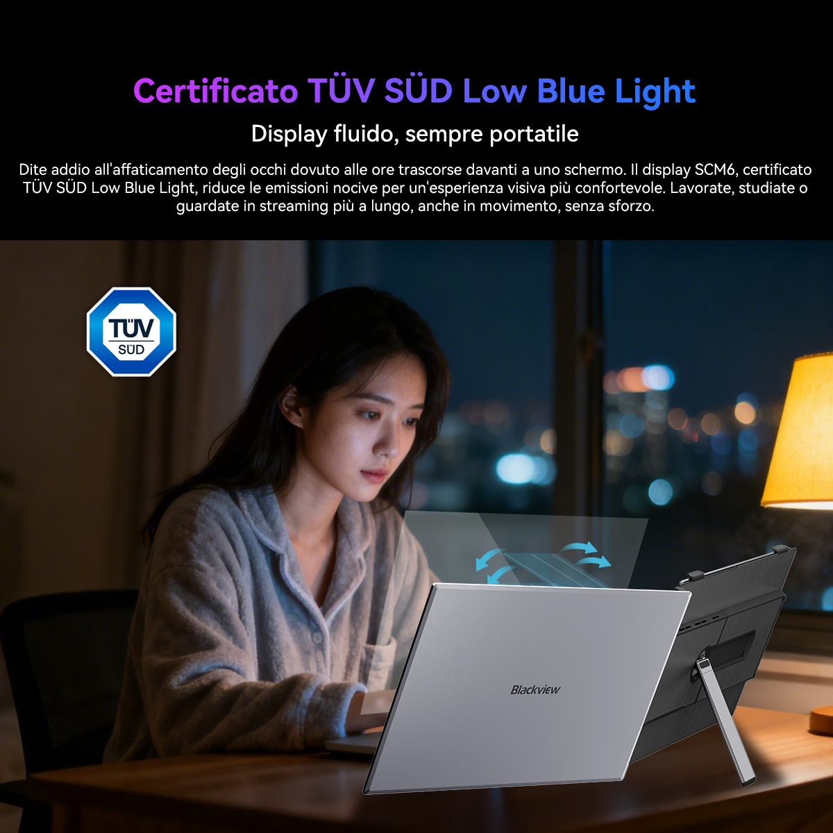 Una donna guarda un laptop con certificazione TÜV SÜD Low Blue Light.