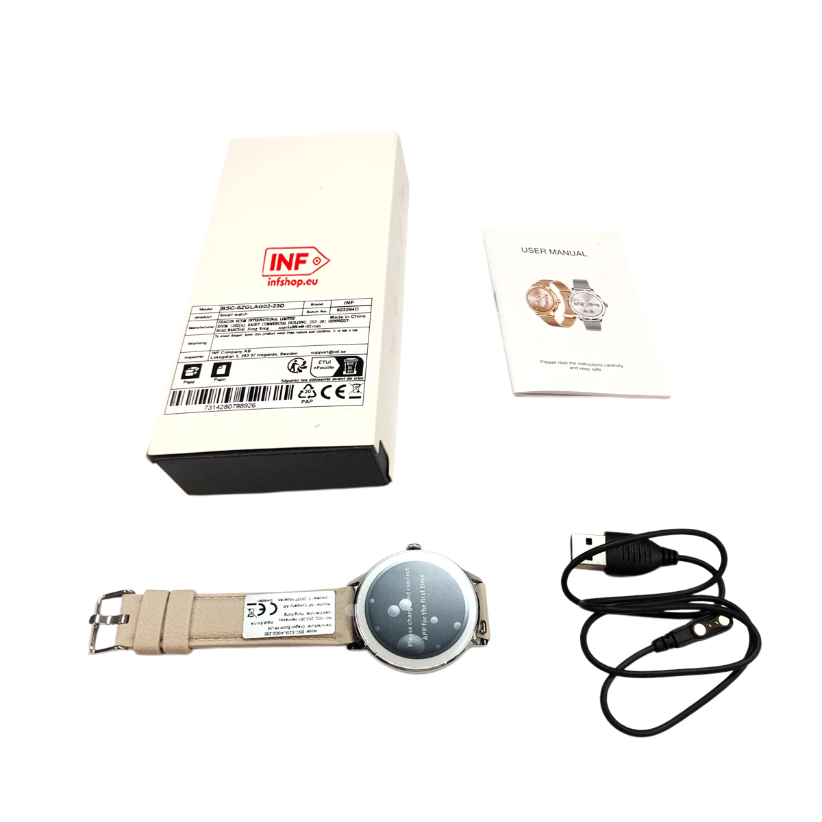 Smartwatch set with box, manual and charging cable on a white background.