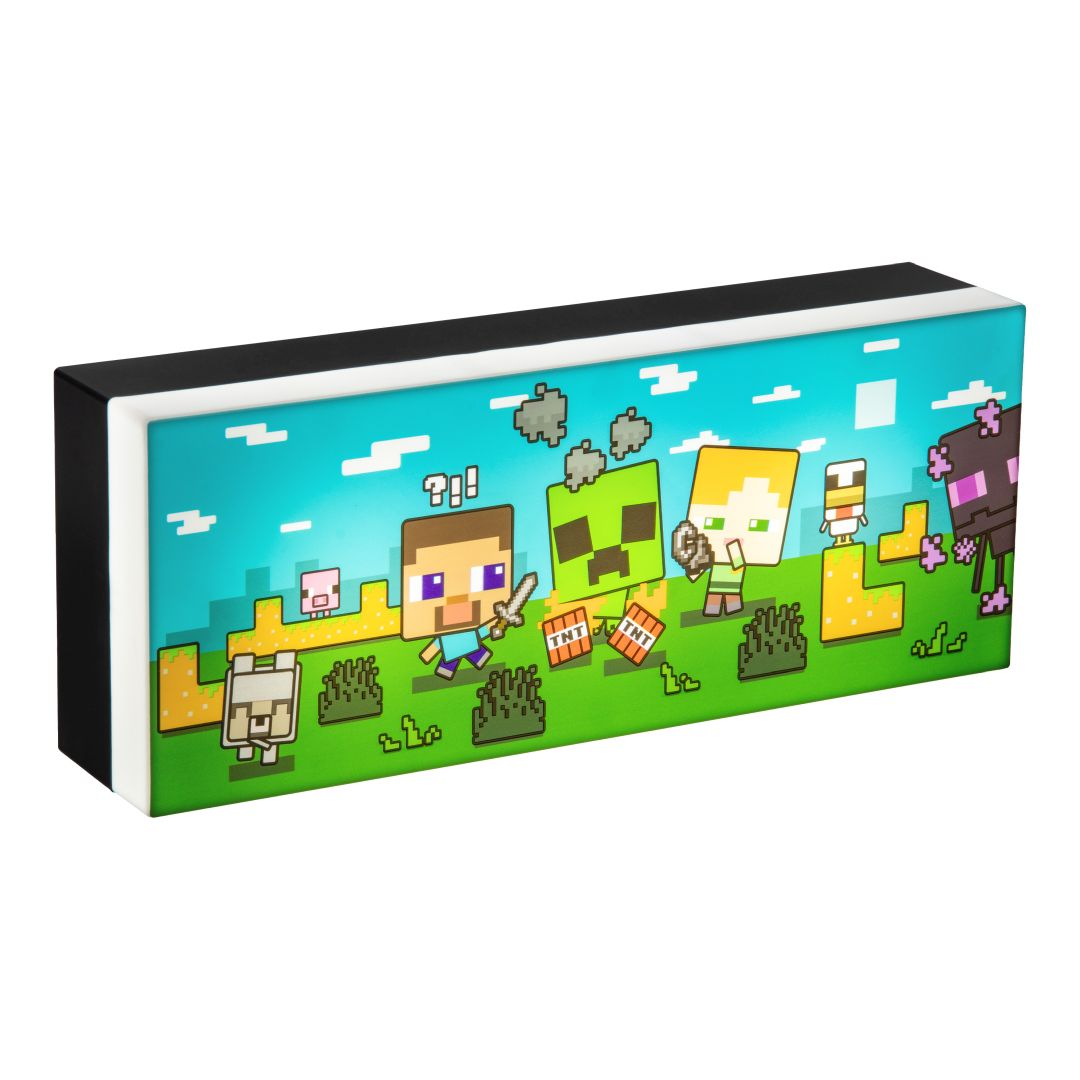 Postacie z Minecraft z TNT na zielonym polu pod niebieskim niebem.