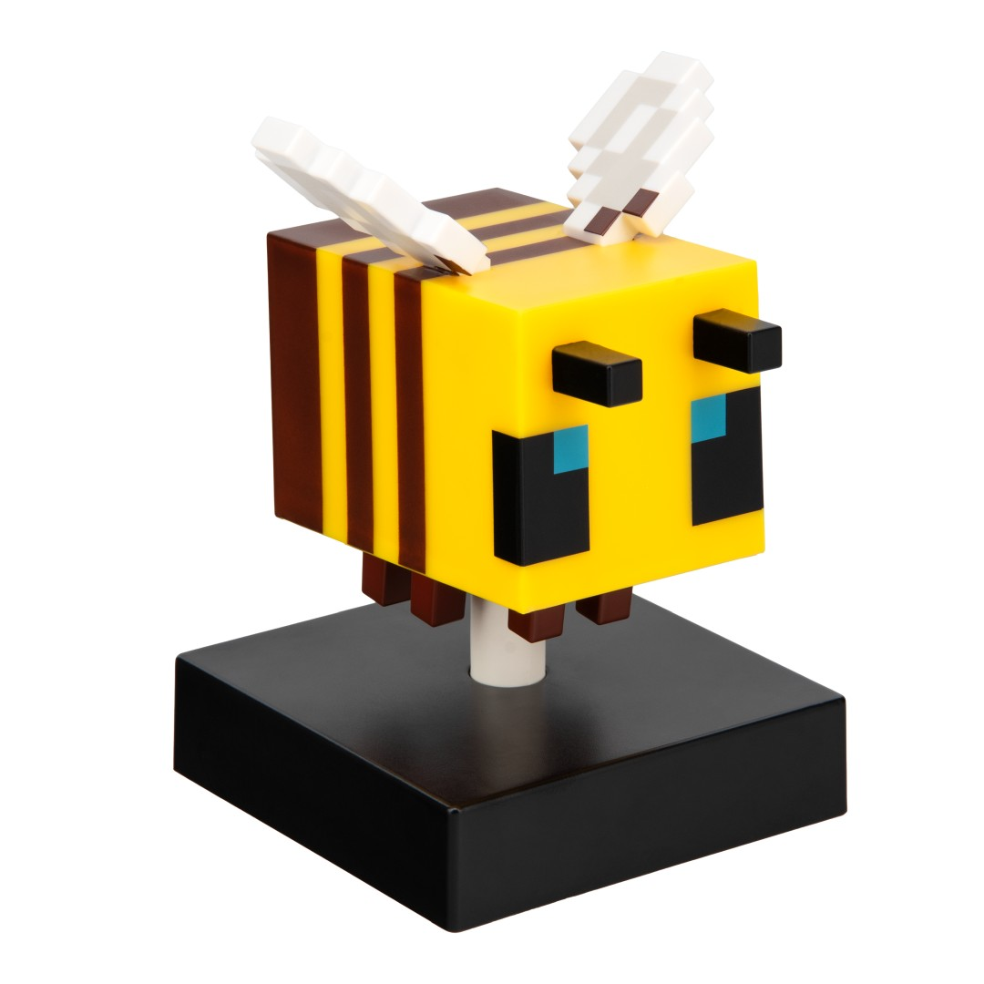 Pikselowa figurka pszczoły z Minecraft w paski czarno-żółte na czarnej podstawie.