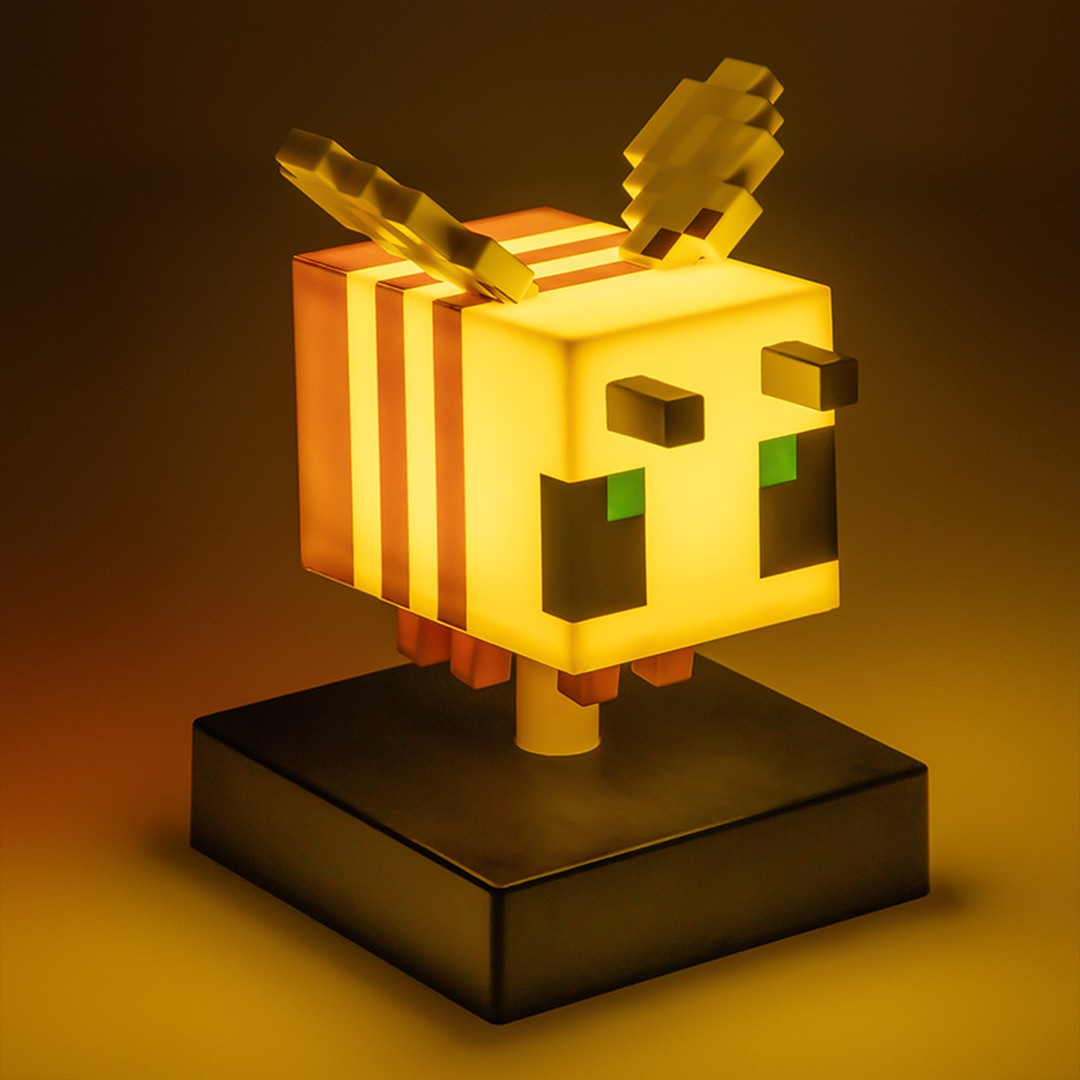 Lampa pszczoła z Minecraft, żółto-pomarańczowe paski, czarna podstawa.