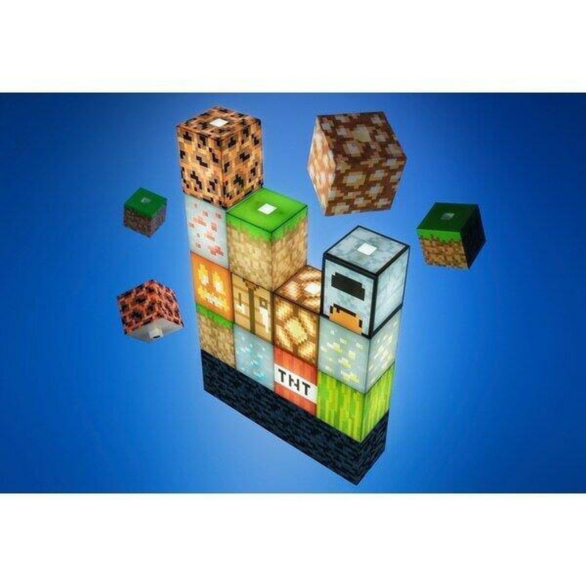 Bloki Minecraft z różnymi teksturami, w tym trawą, TNT i twarzą, unoszą się.