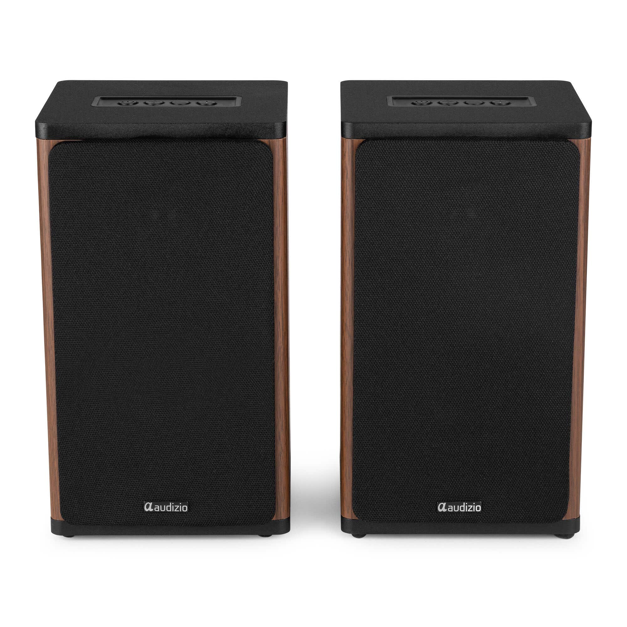 Dos altavoces negros con detalles de madera y botones de control.